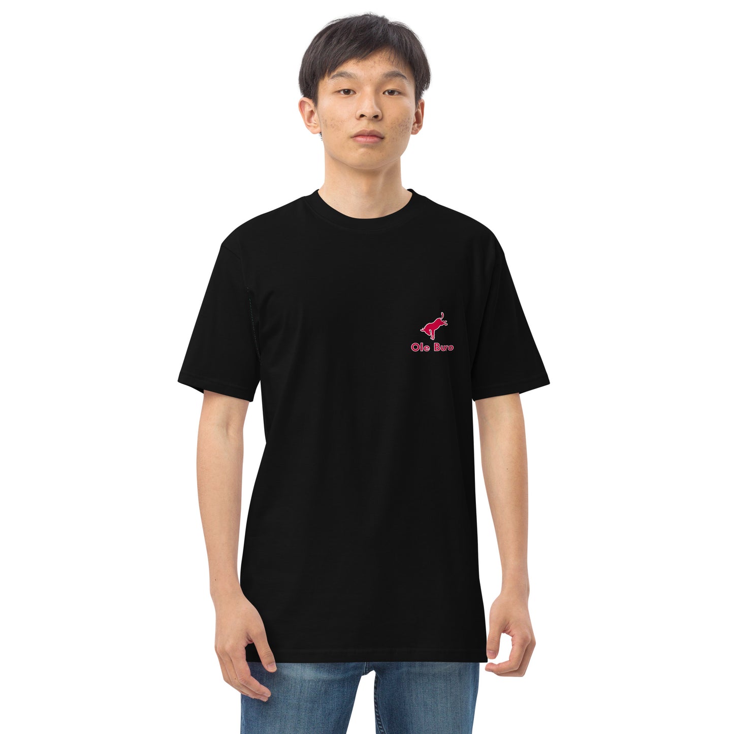 Person wearing a black t-shirt with a red logo on a white background