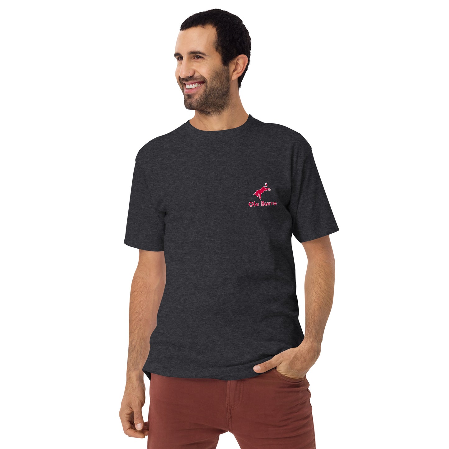 Man wearing a black t-shirt with a red logo on a white background