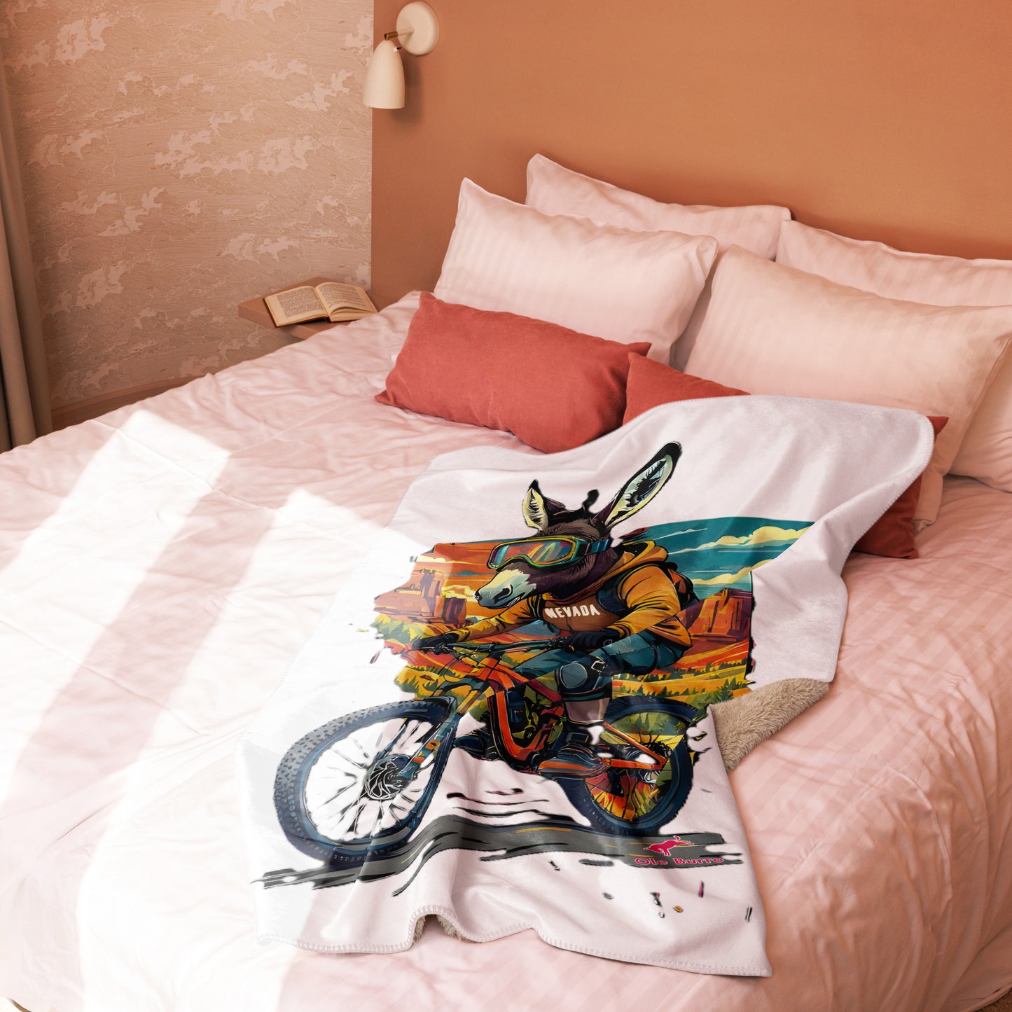 Colorful motorcycle design on a white blanket draped over a bed with pink bedding.
