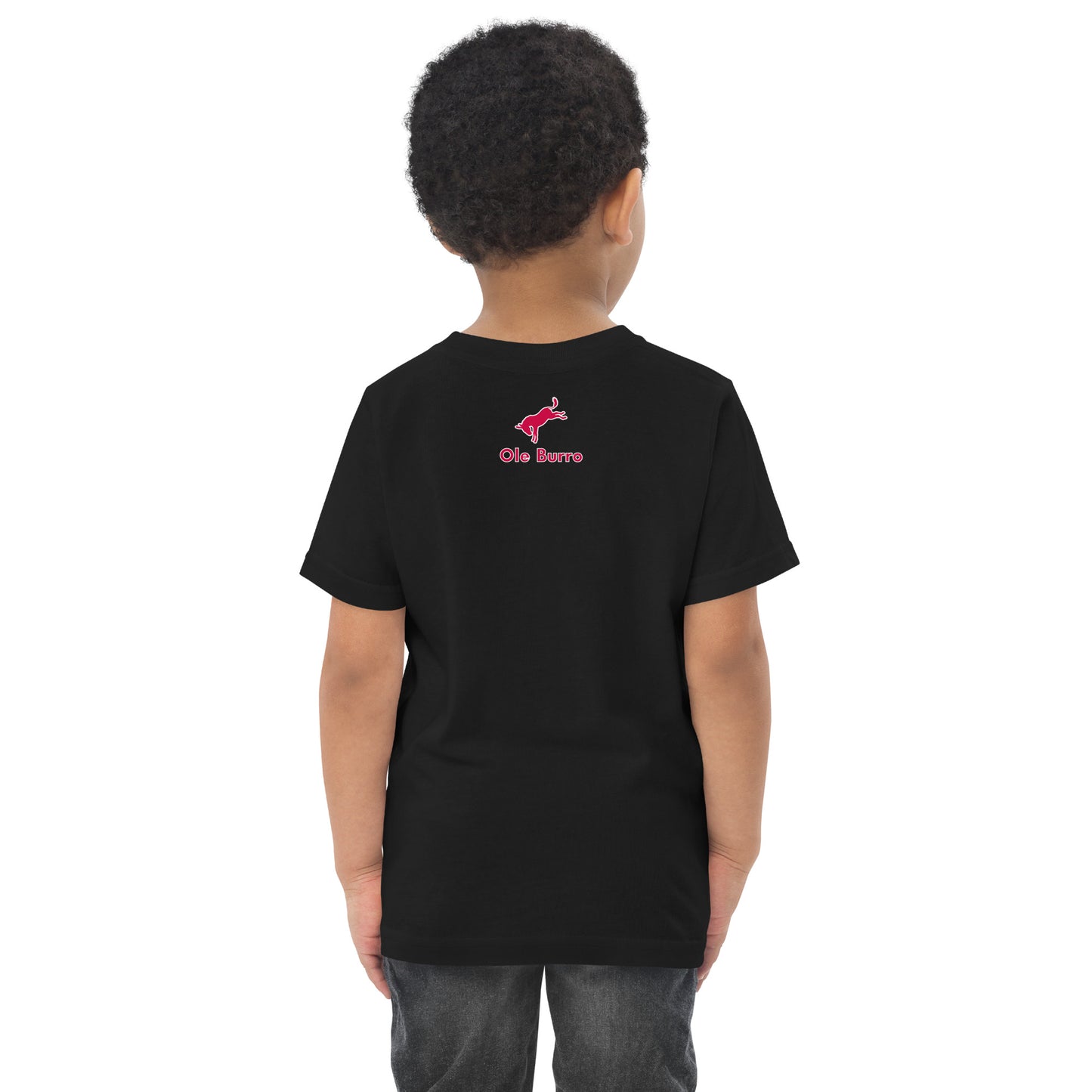 Child wearing a black t-shirt with a logo on the back against a white background