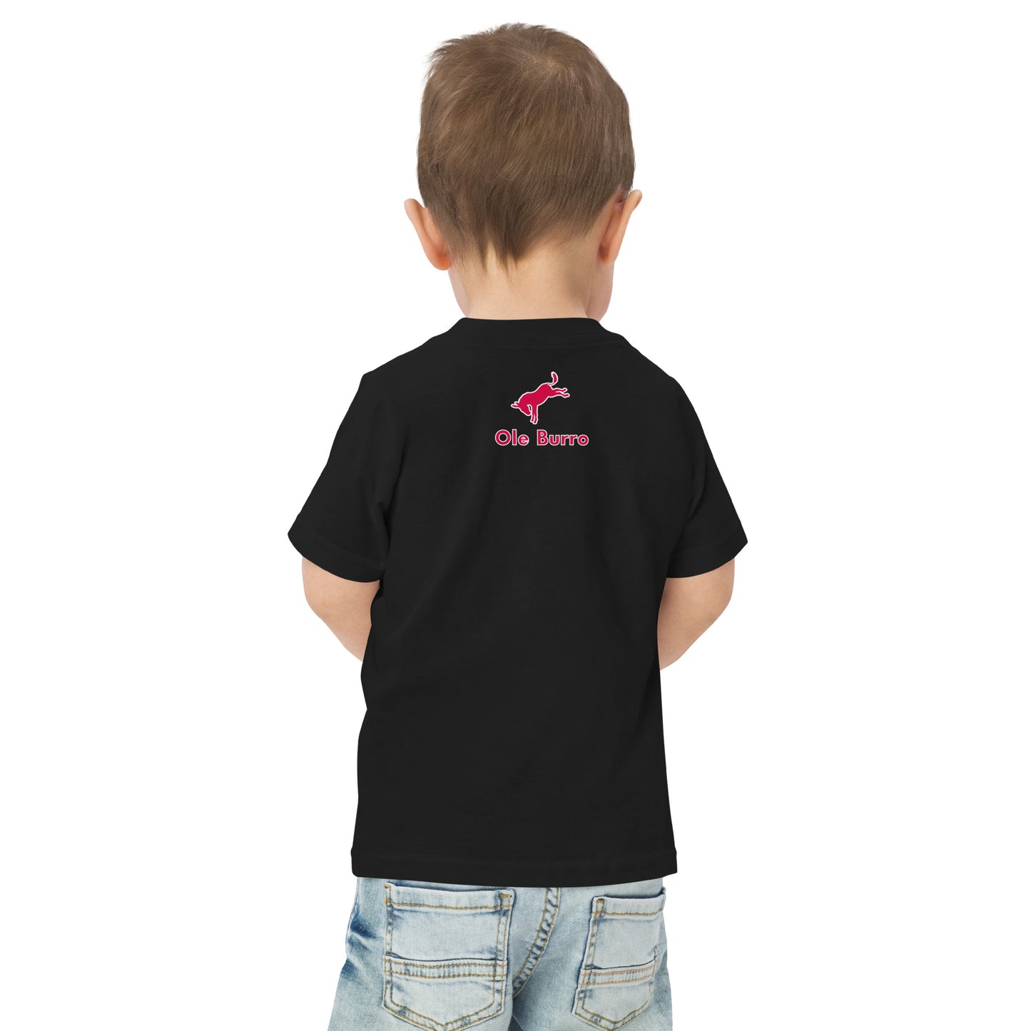 Child wearing a black t-shirt with a logo on the back against a white background