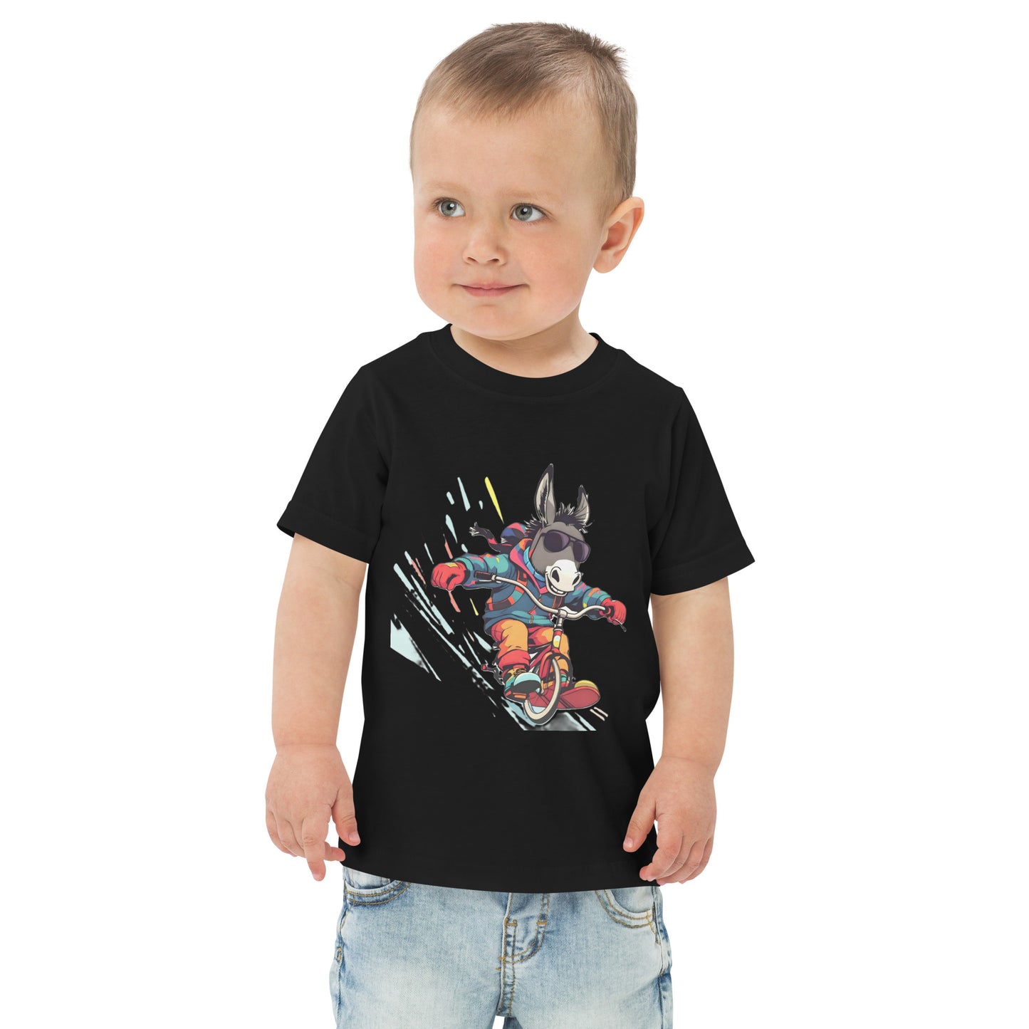 Child wearing a black t-shirt with a colorful graphic design on a white background