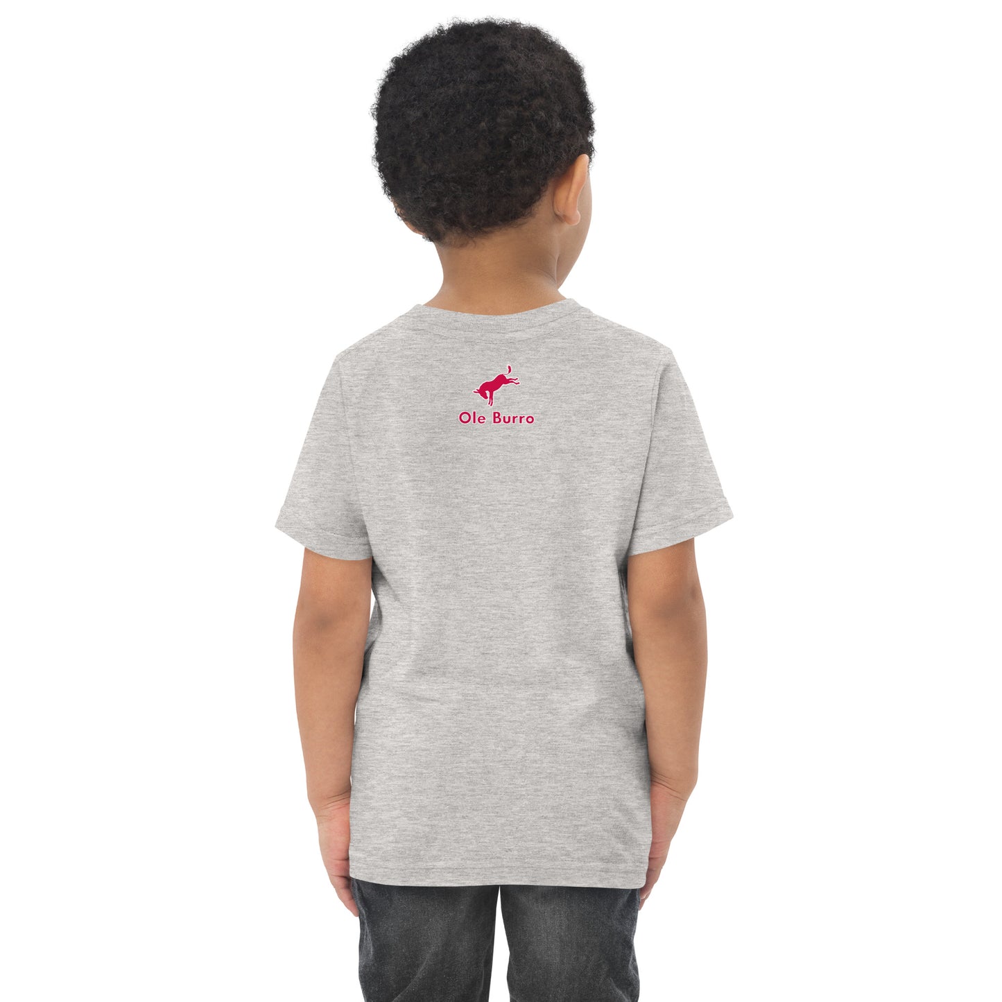 Child wearing a gray t-shirt with a red logo on the back against a white background
