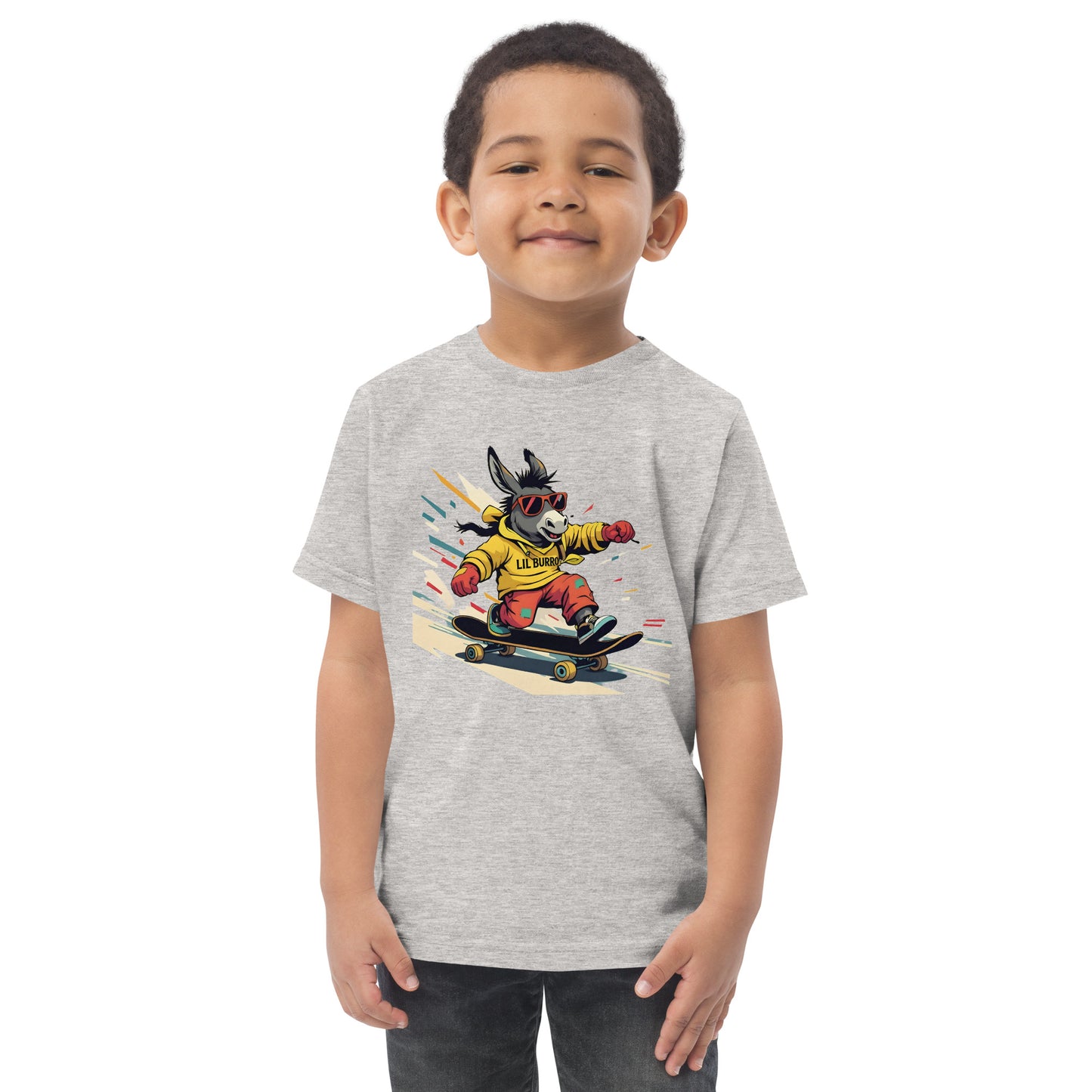 Child wearing a gray t-shirt with a cartoon donkey on a skateboard graphic.