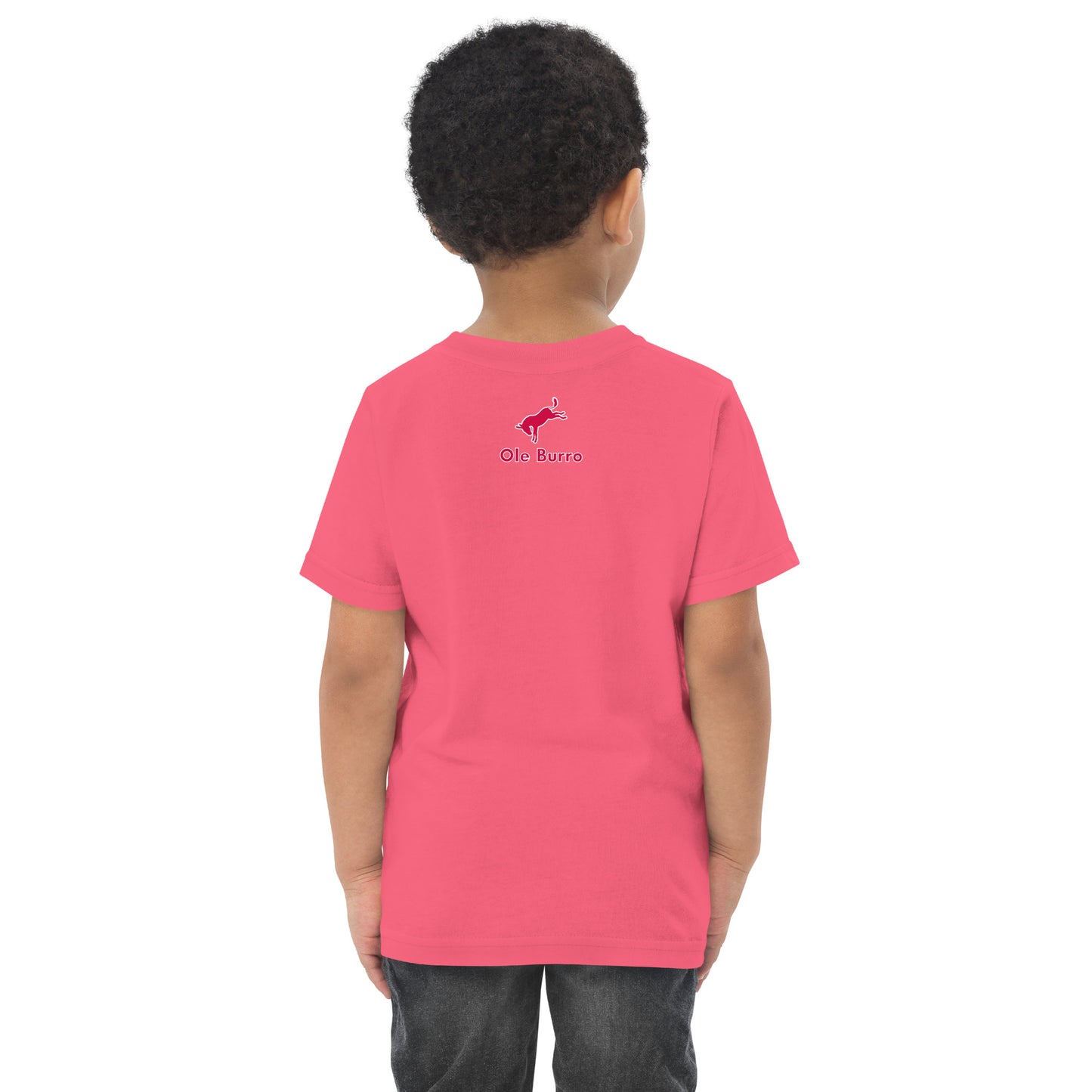 Child wearing a pink t-shirt with a logo on the back against a white background