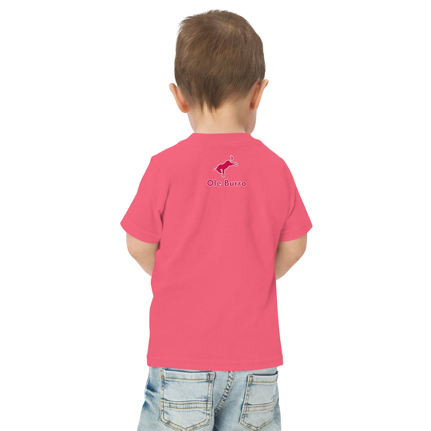 Child wearing a pink t-shirt with a logo on the back against a white background