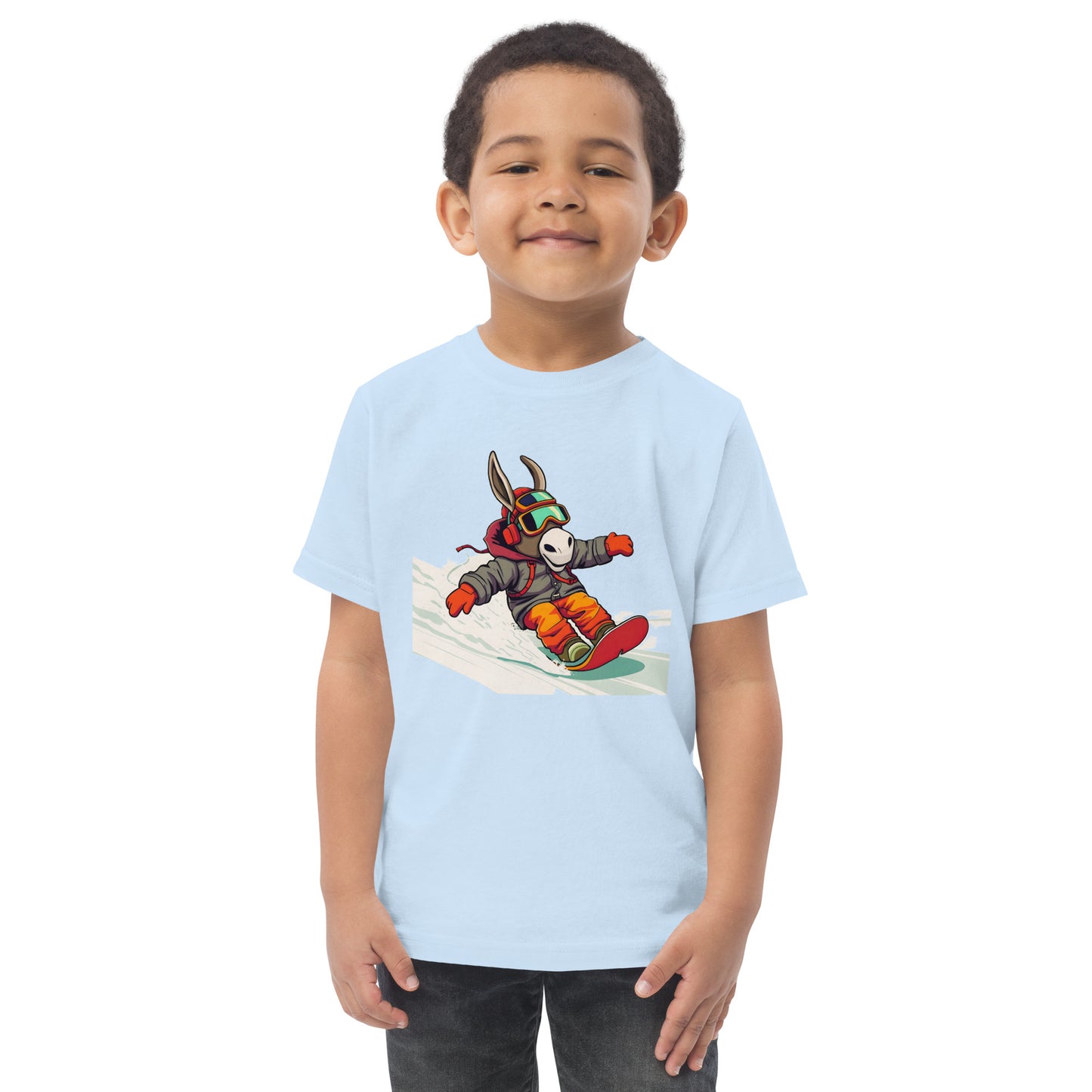 Child wearing a light blue t-shirt with a cartoon character on a white background