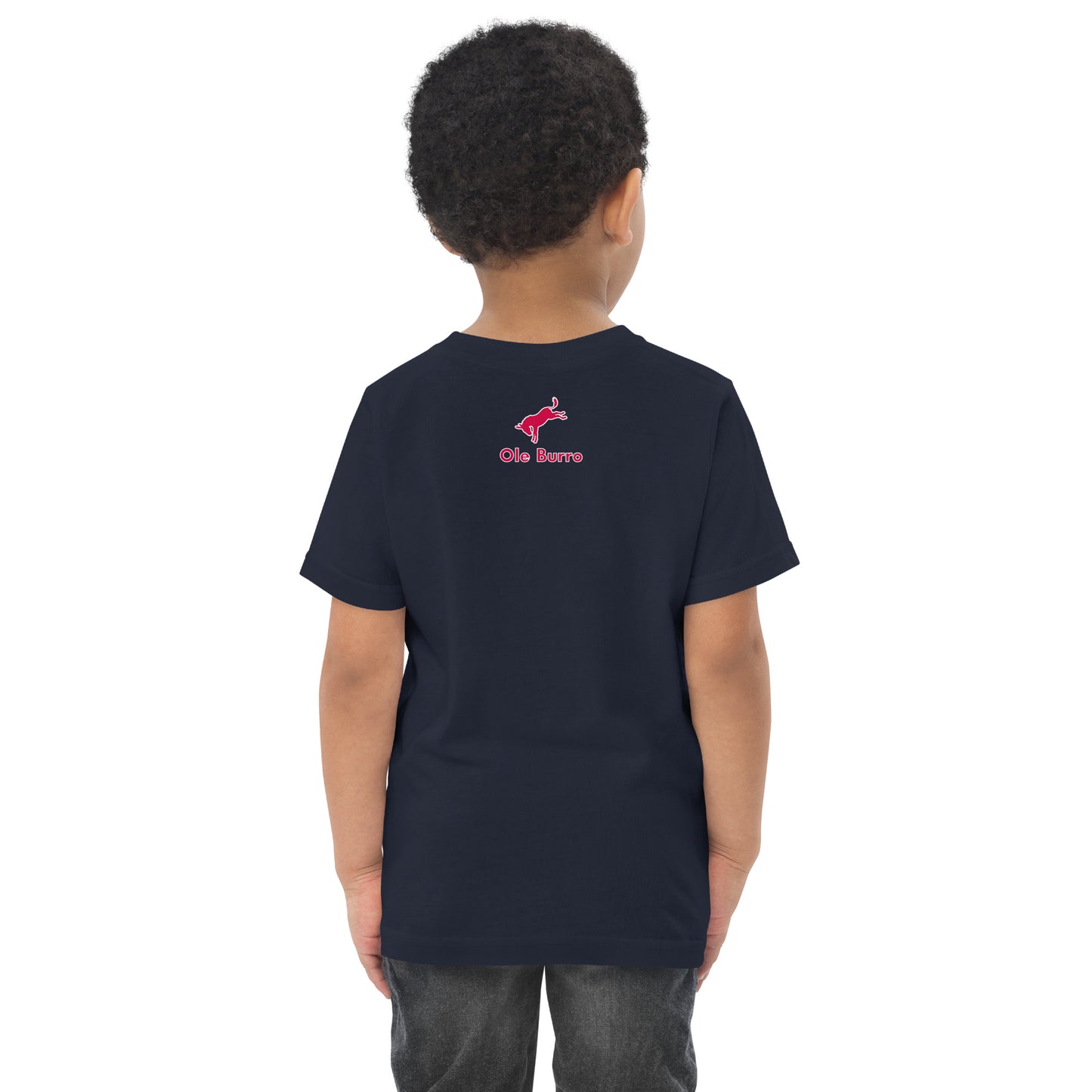 Child wearing a black t-shirt with a red logo on the back against a white background