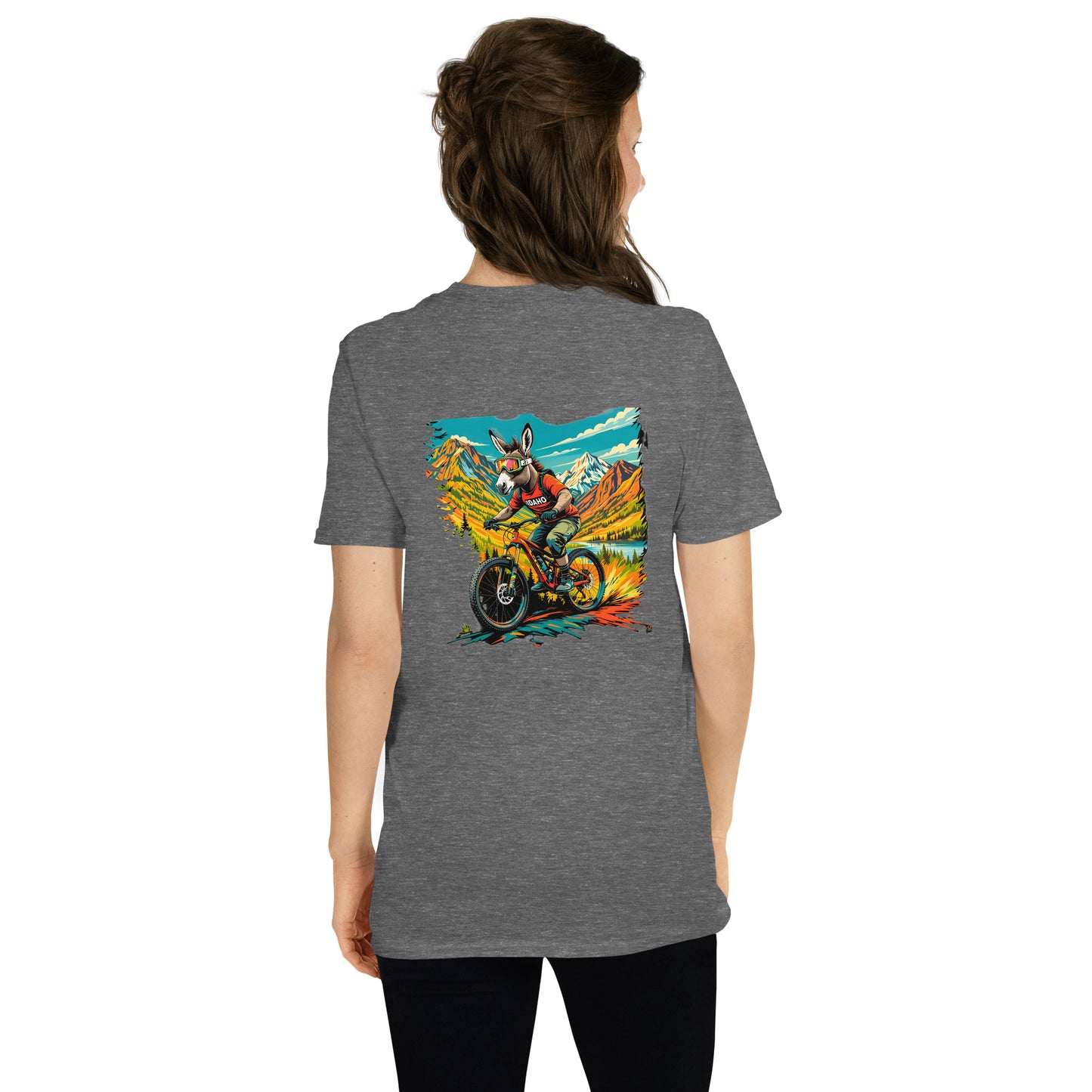Person wearing a gray t-shirt with a colorful graphic on the back
