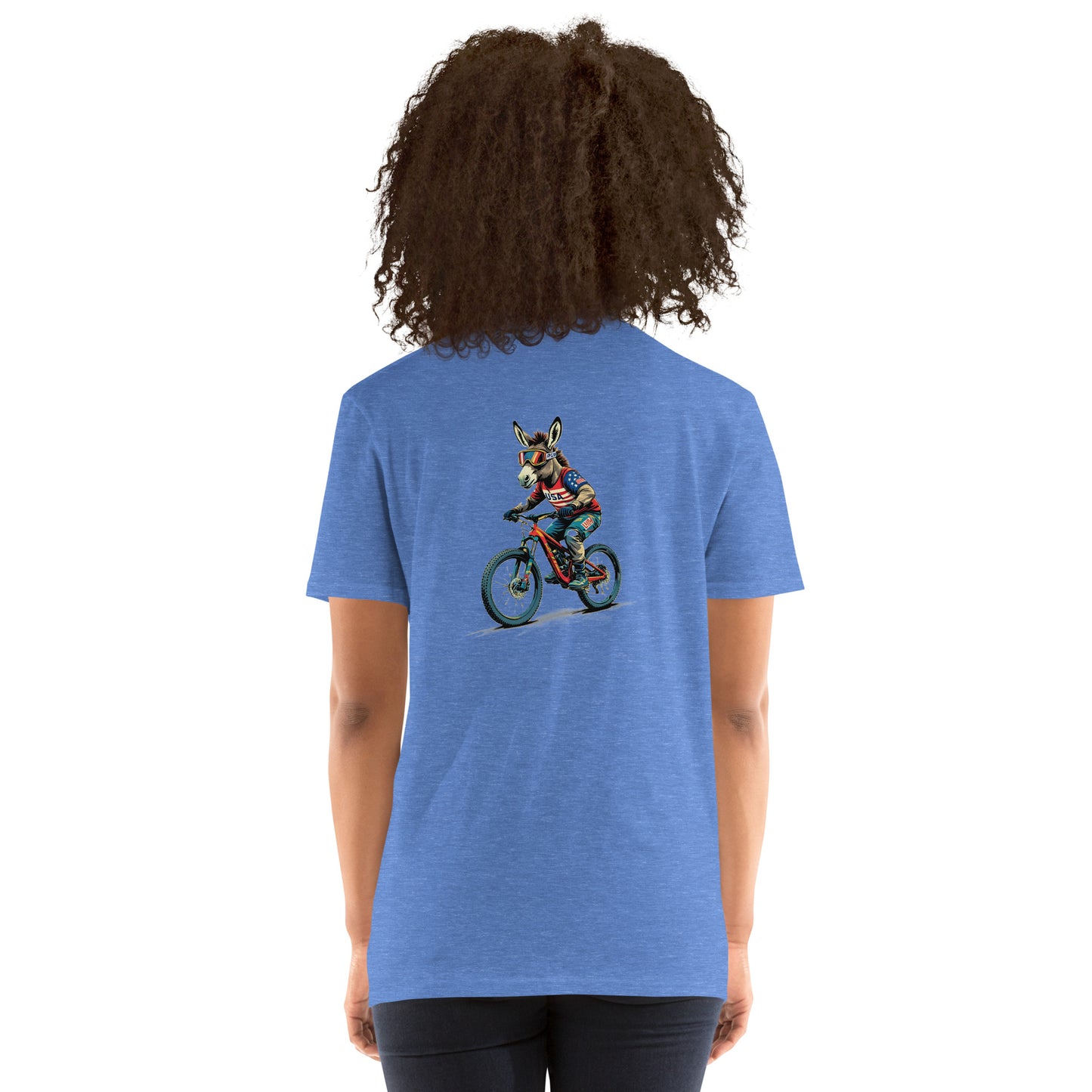 Person wearing a blue t-shirt with a graphic of a dog riding a bike on the back.
