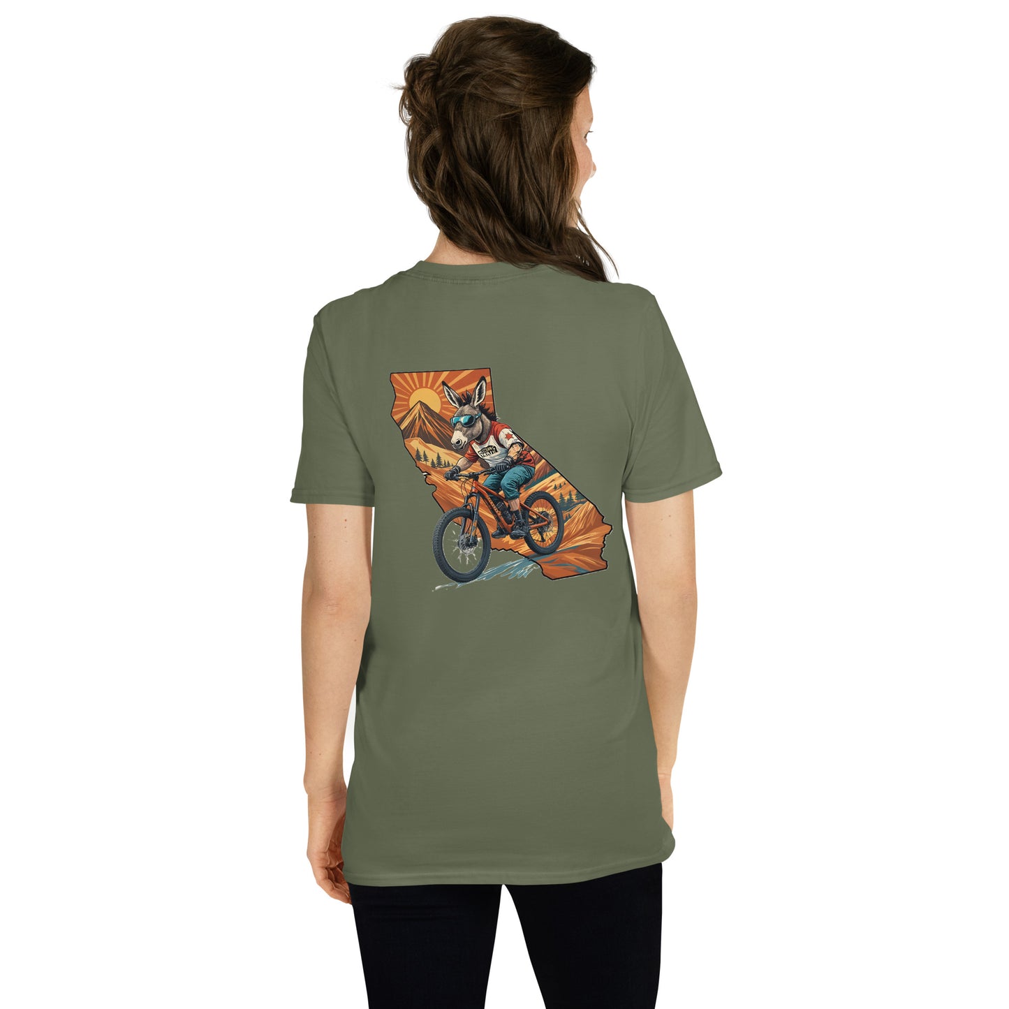 Person wearing a green t-shirt with a graphic design on the back, standing against a white background
