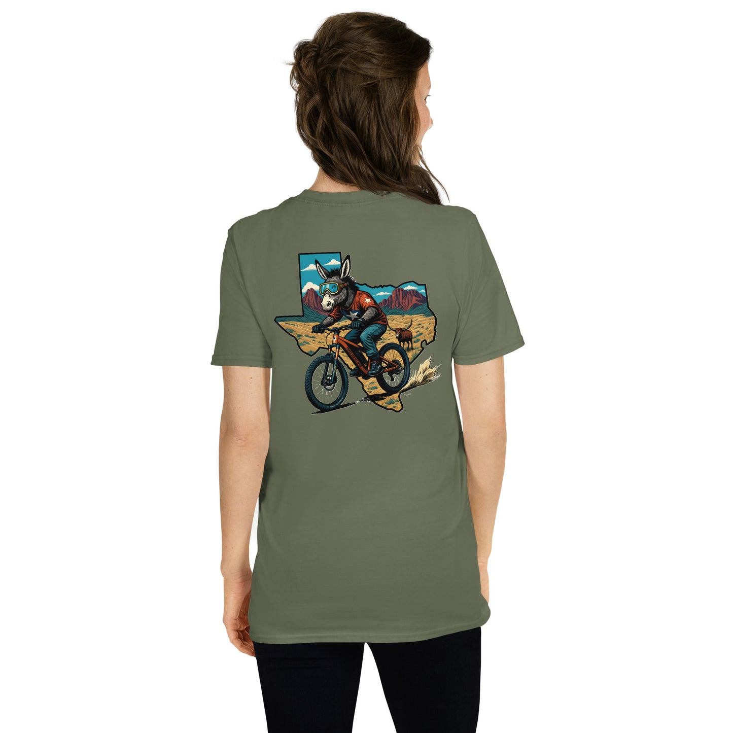 Person wearing a green t-shirt with a graphic design on the back, standing against a white background