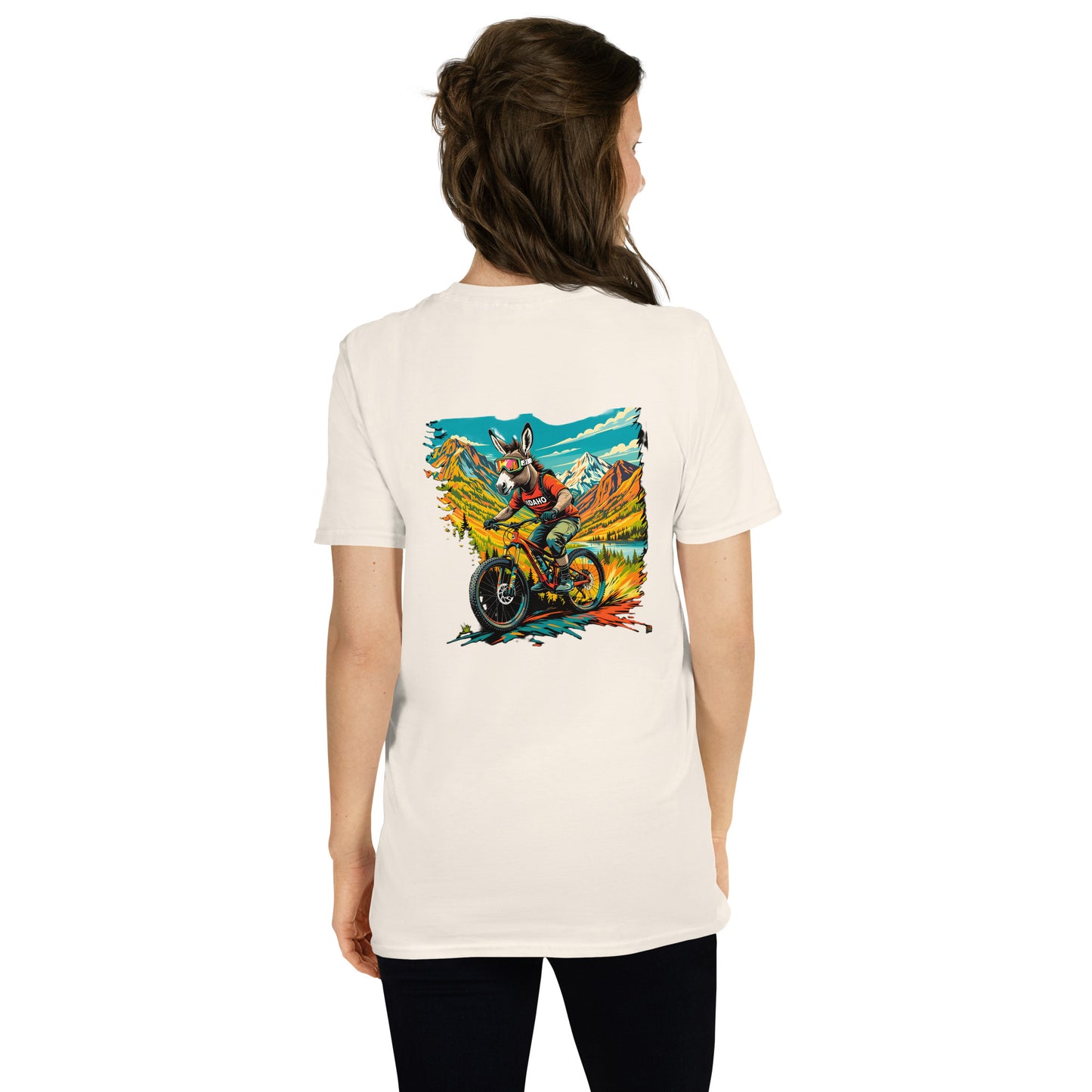 Person wearing a white t-shirt with a colorful graphic on the back, standing against a white background