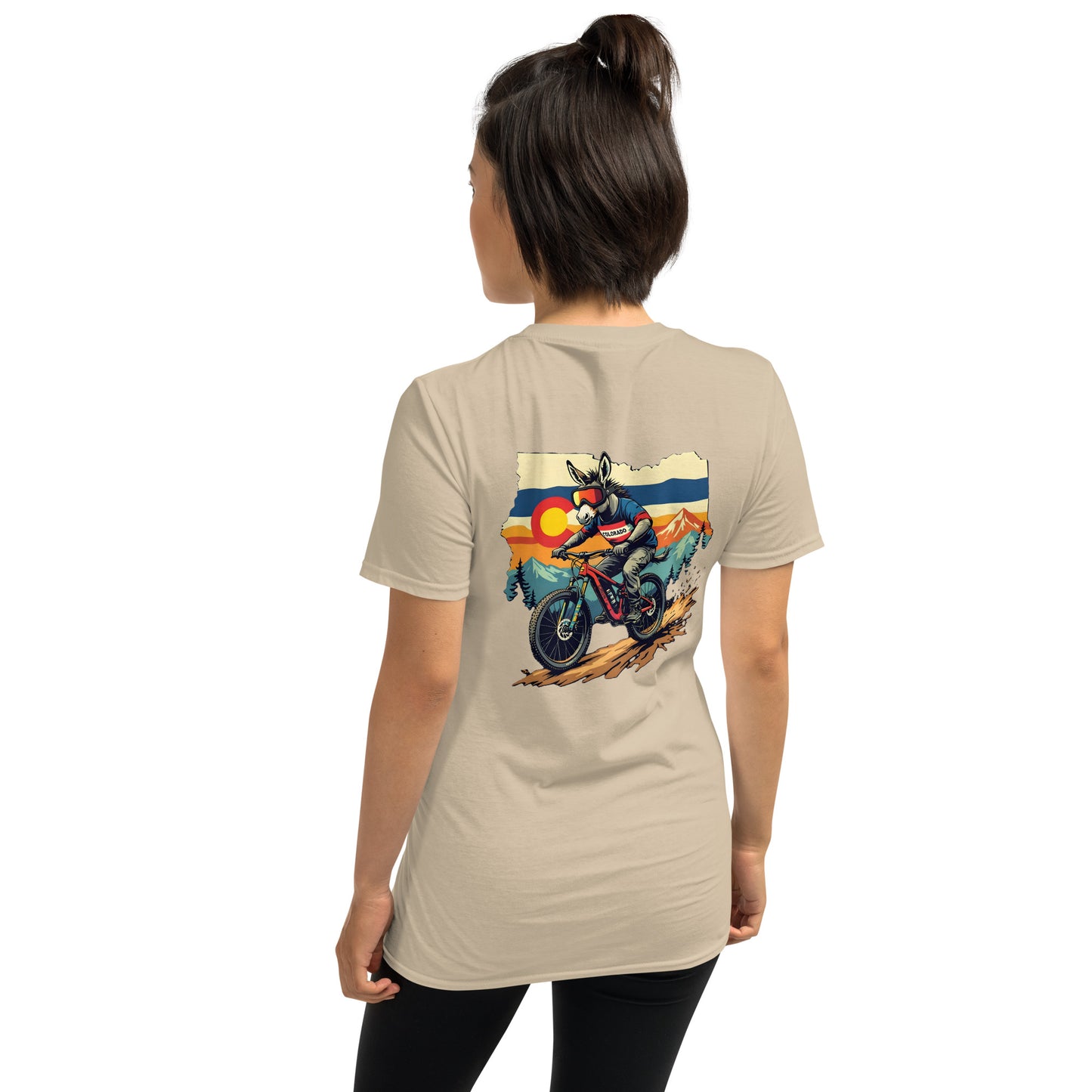 Person wearing a beige t-shirt with a graphic of a motorcycle and Colorado flag on the back.