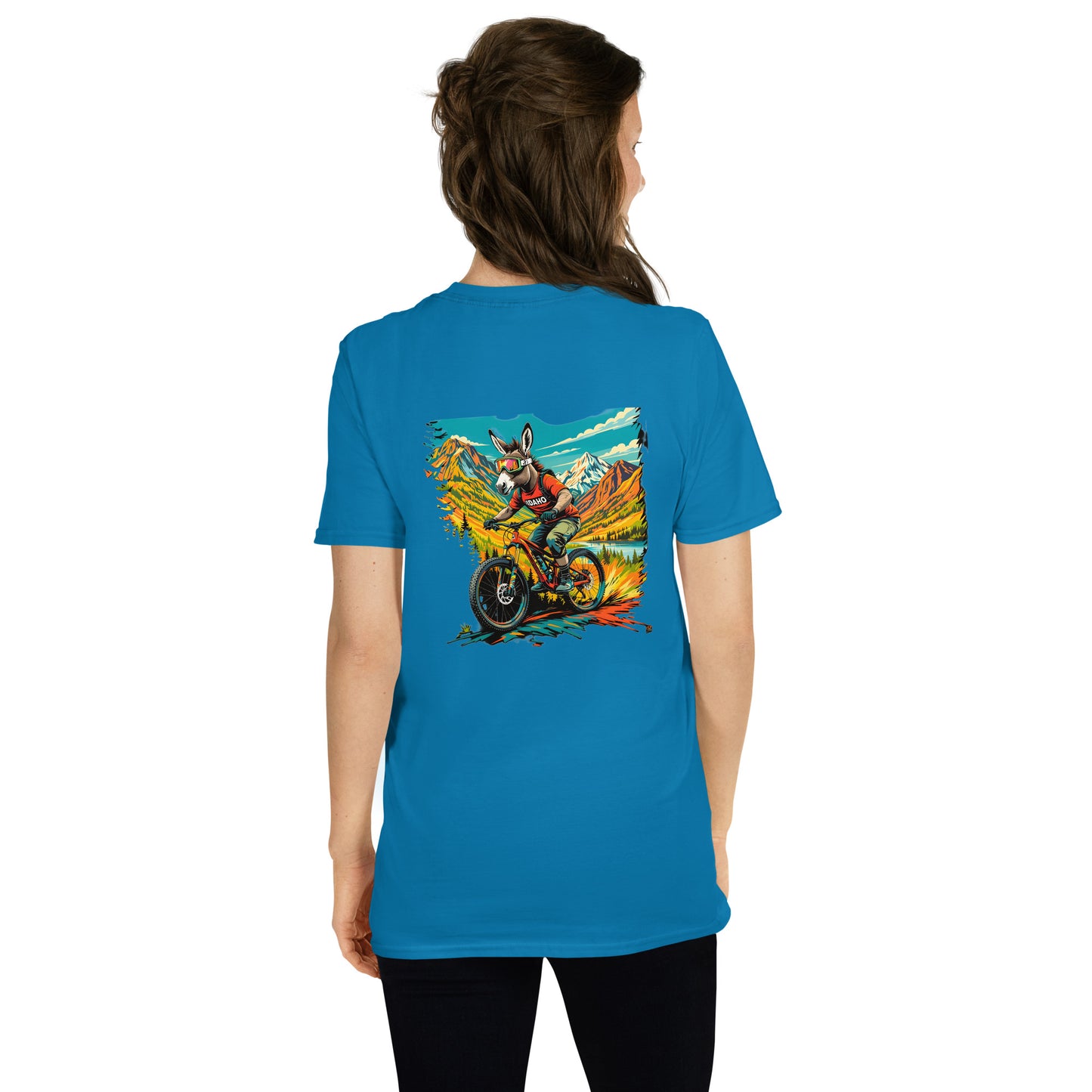 Person wearing a blue t-shirt with a graphic design on the back
