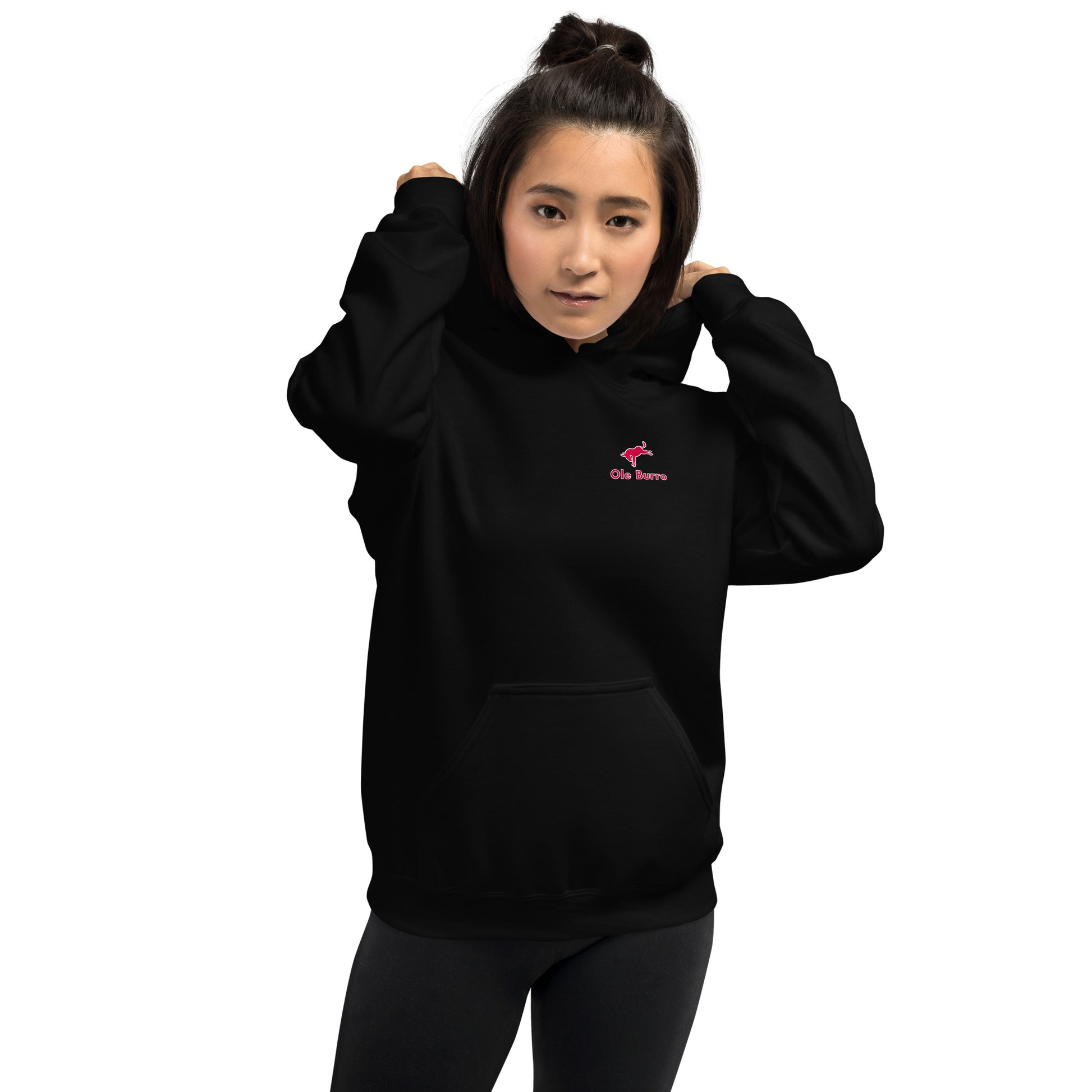 Person wearing a black hoodie with a logo on a white background