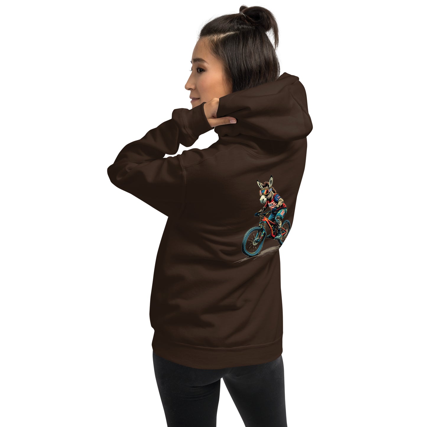 Person wearing a brown hoodie with a graphic design on the back