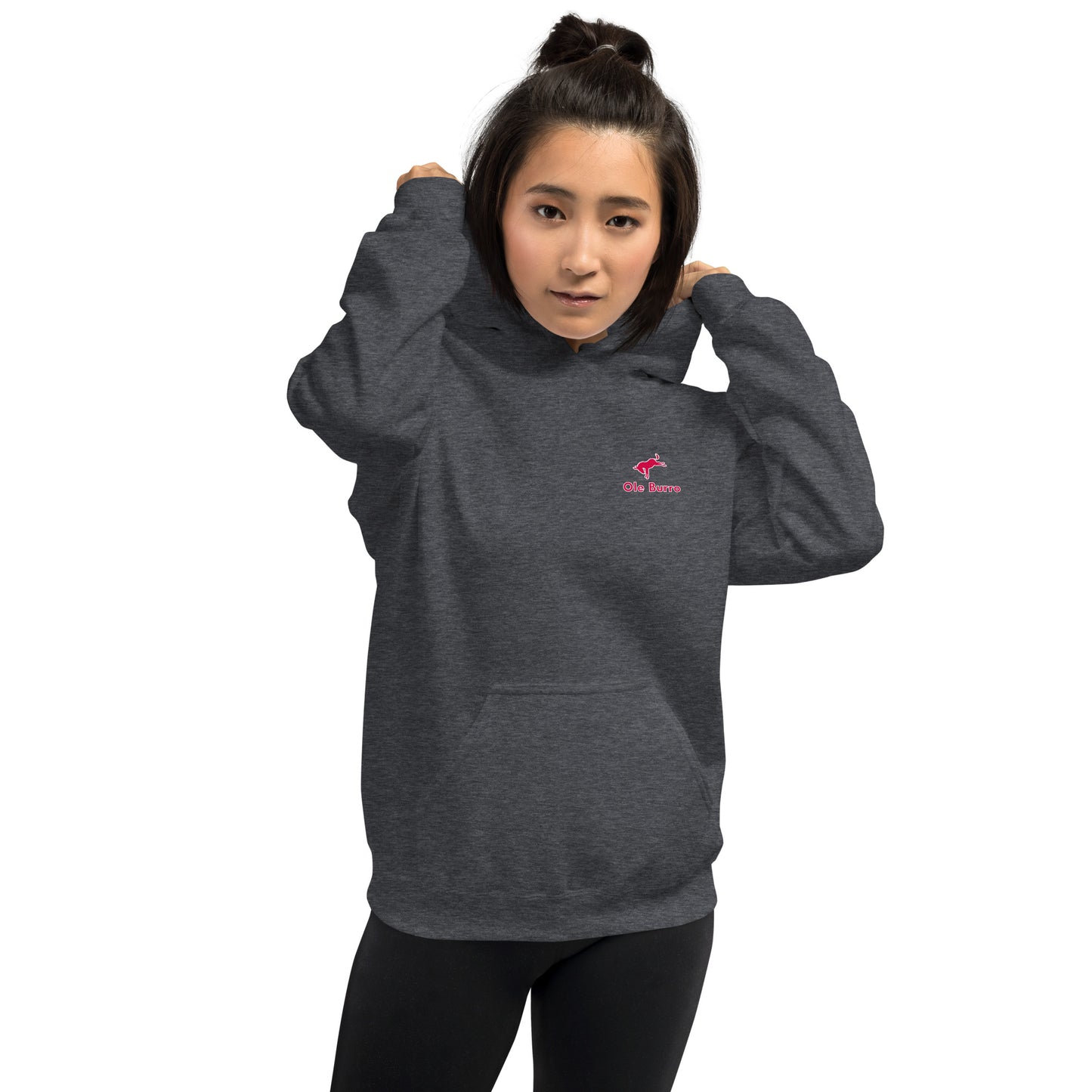 Person wearing a dark gray hoodie with a pink logo on a white background