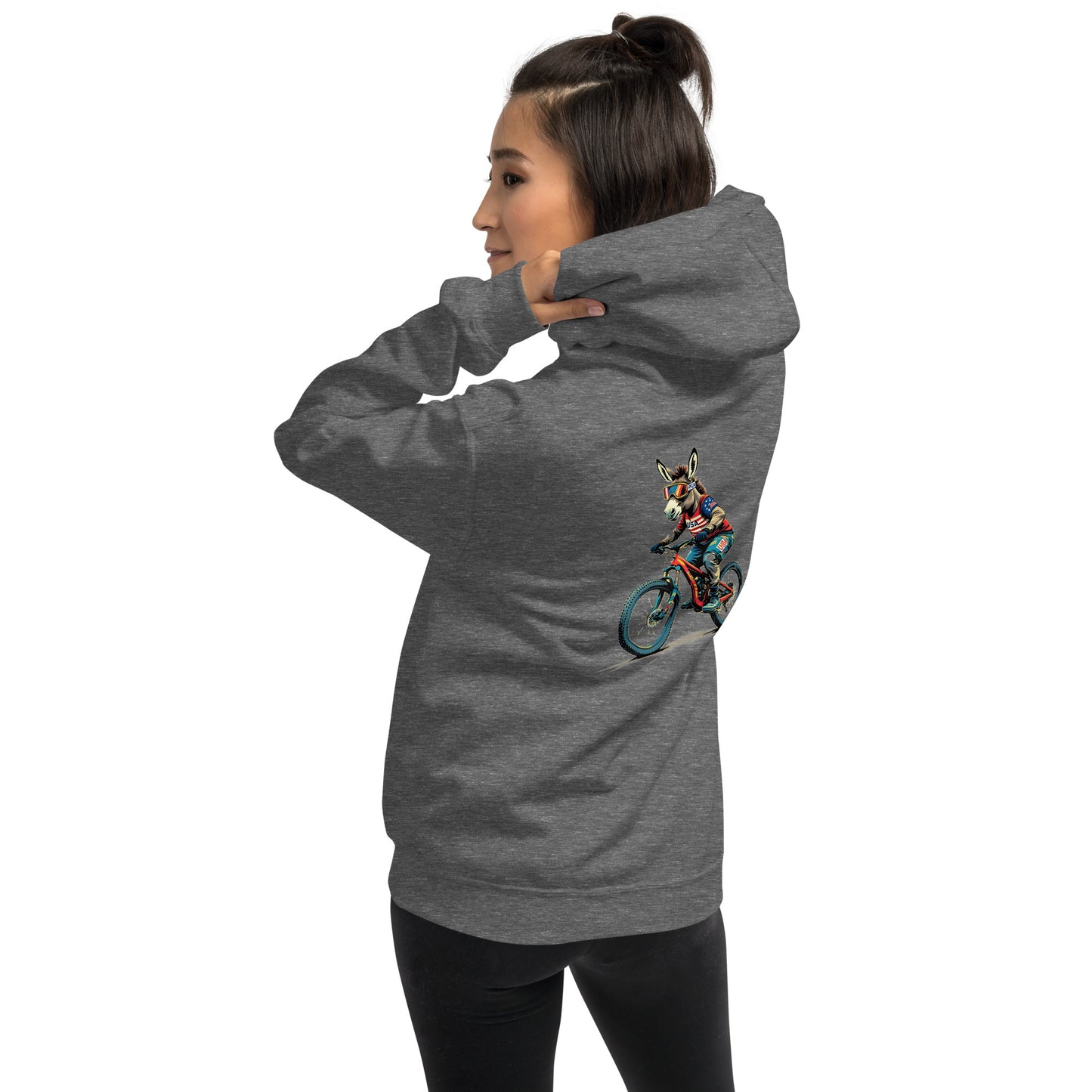 Person wearing a gray hoodie with a graphic of a person on a bike on the back, on a white background