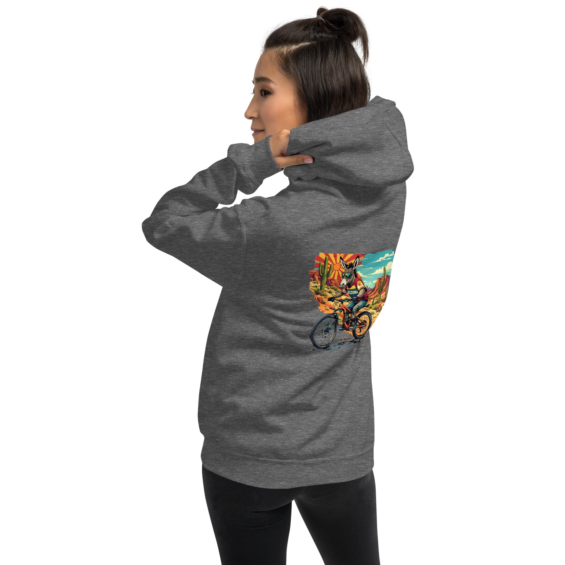 Person wearing a gray hoodie with a colorful graphic on the back