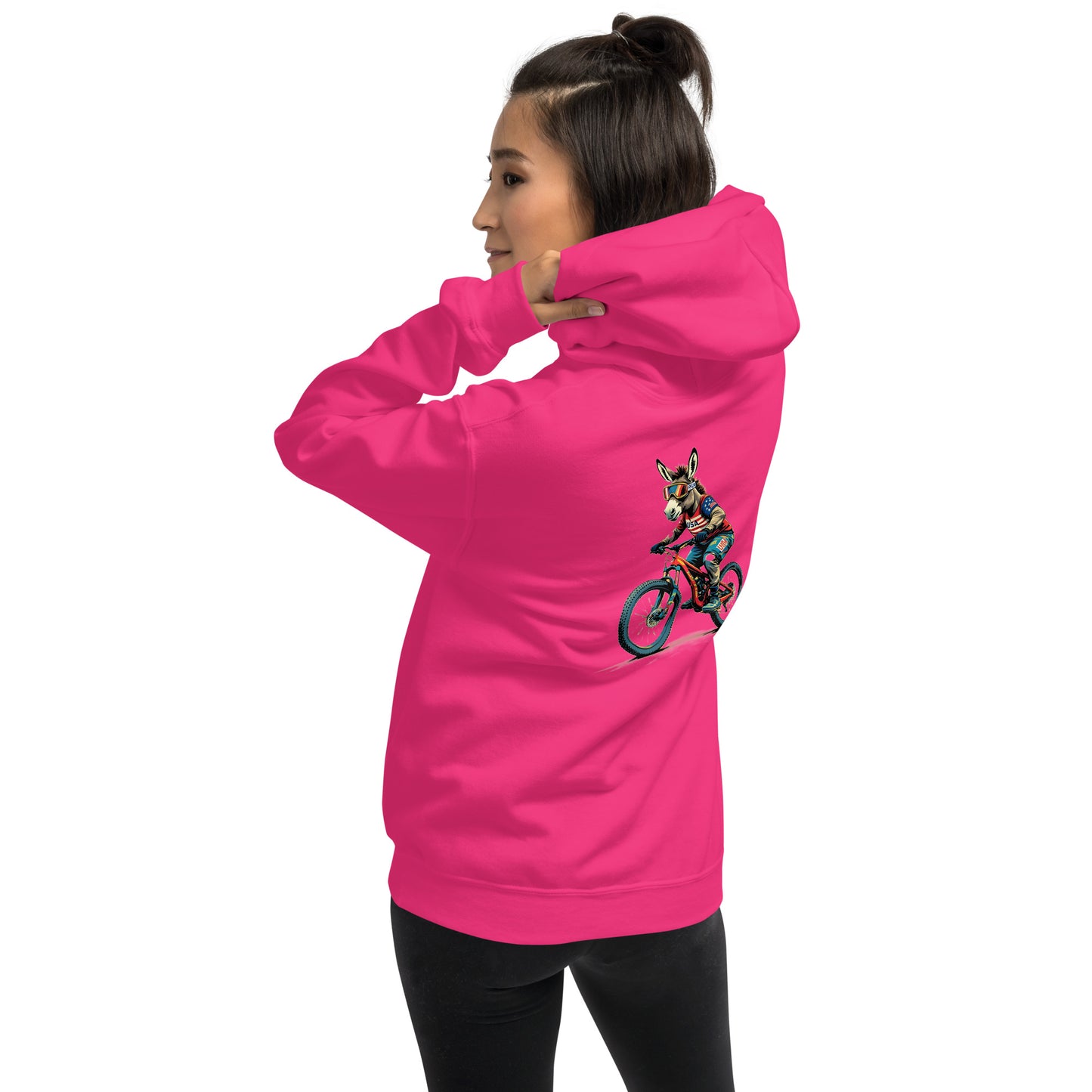 Person wearing a bright pink hoodie with a graphic on the back against a white background