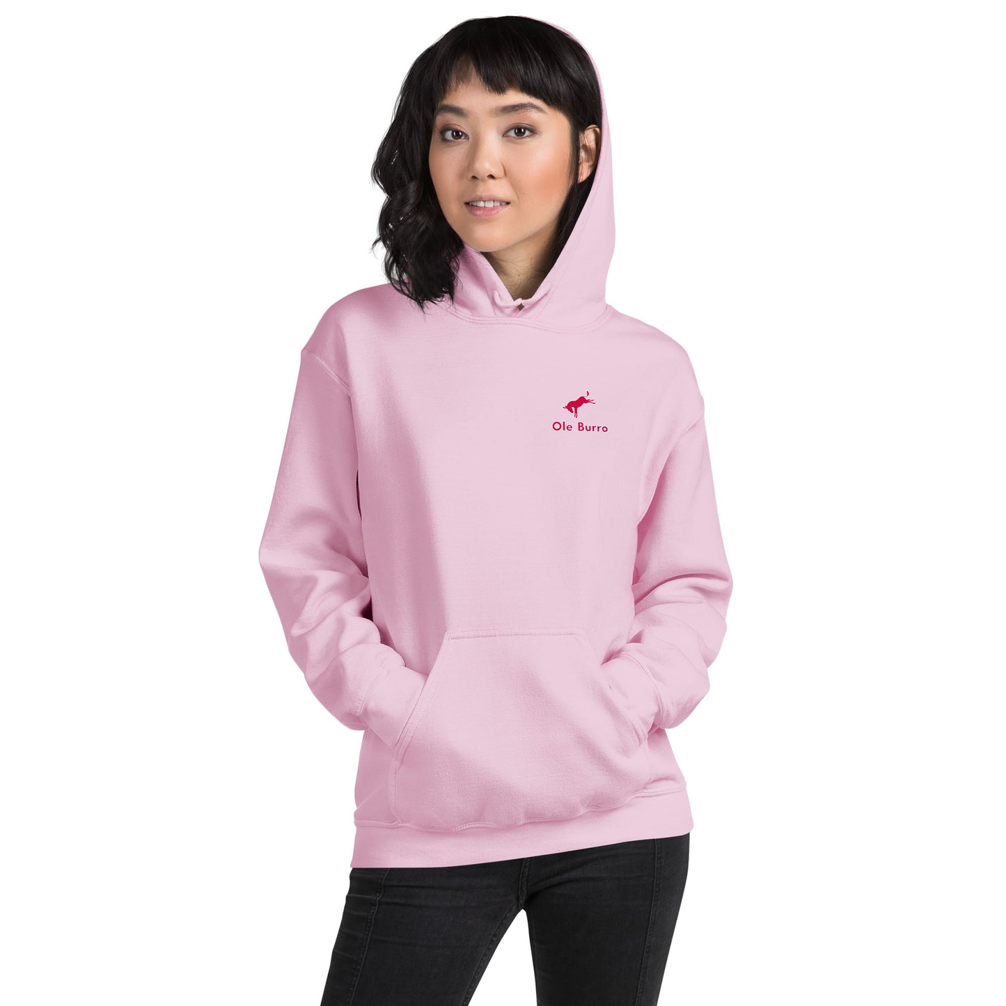 Person wearing a pink hoodie with a logo on a white background