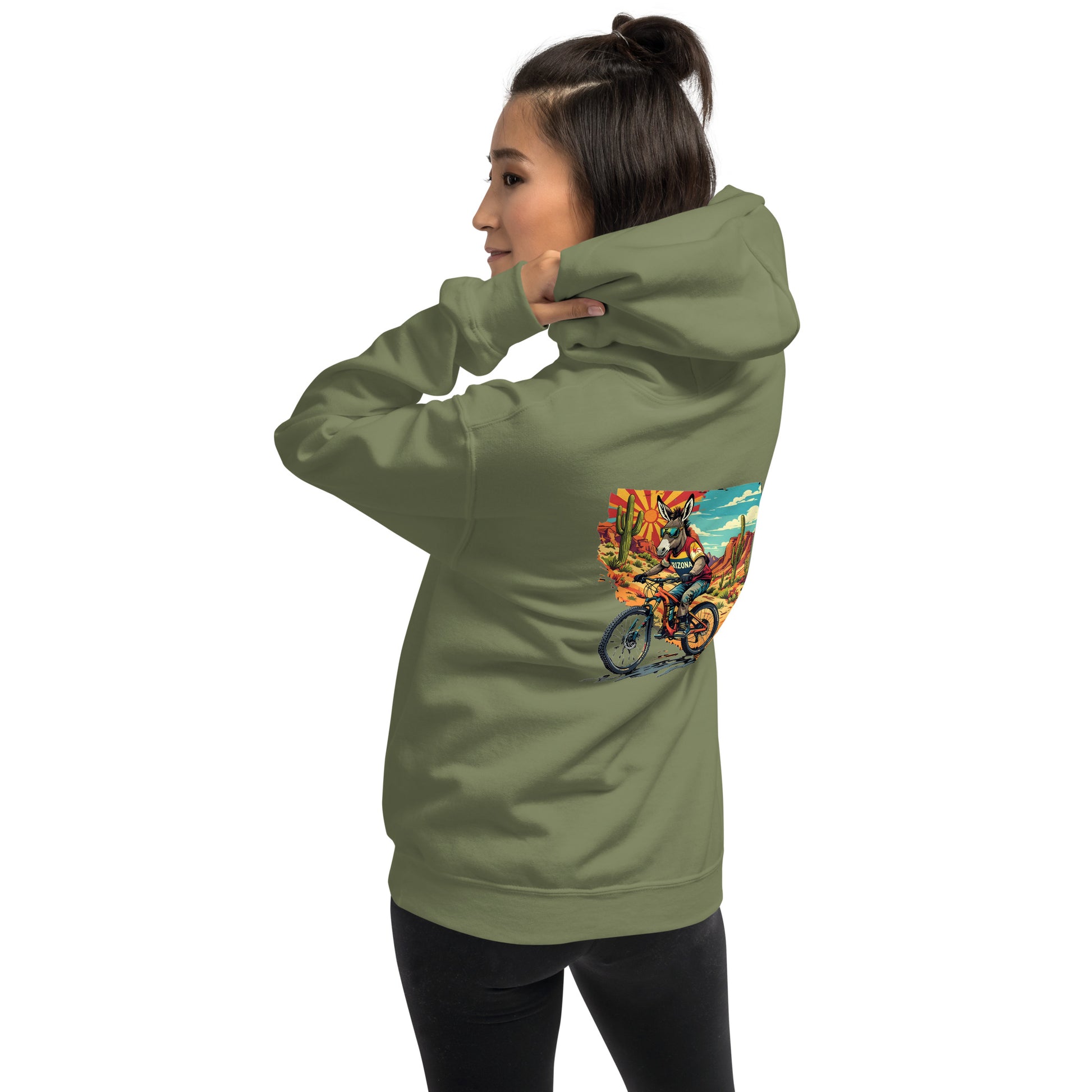 Person wearing a green hoodie with a colorful graphic on the back against a white background