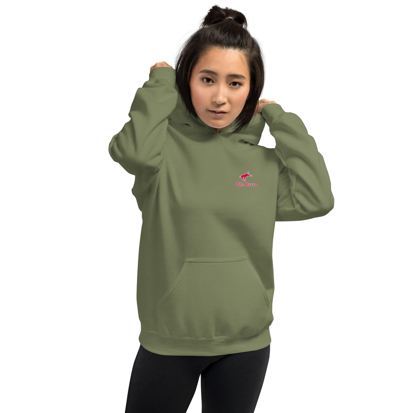Person wearing a green hoodie with a small red logo on a white background
