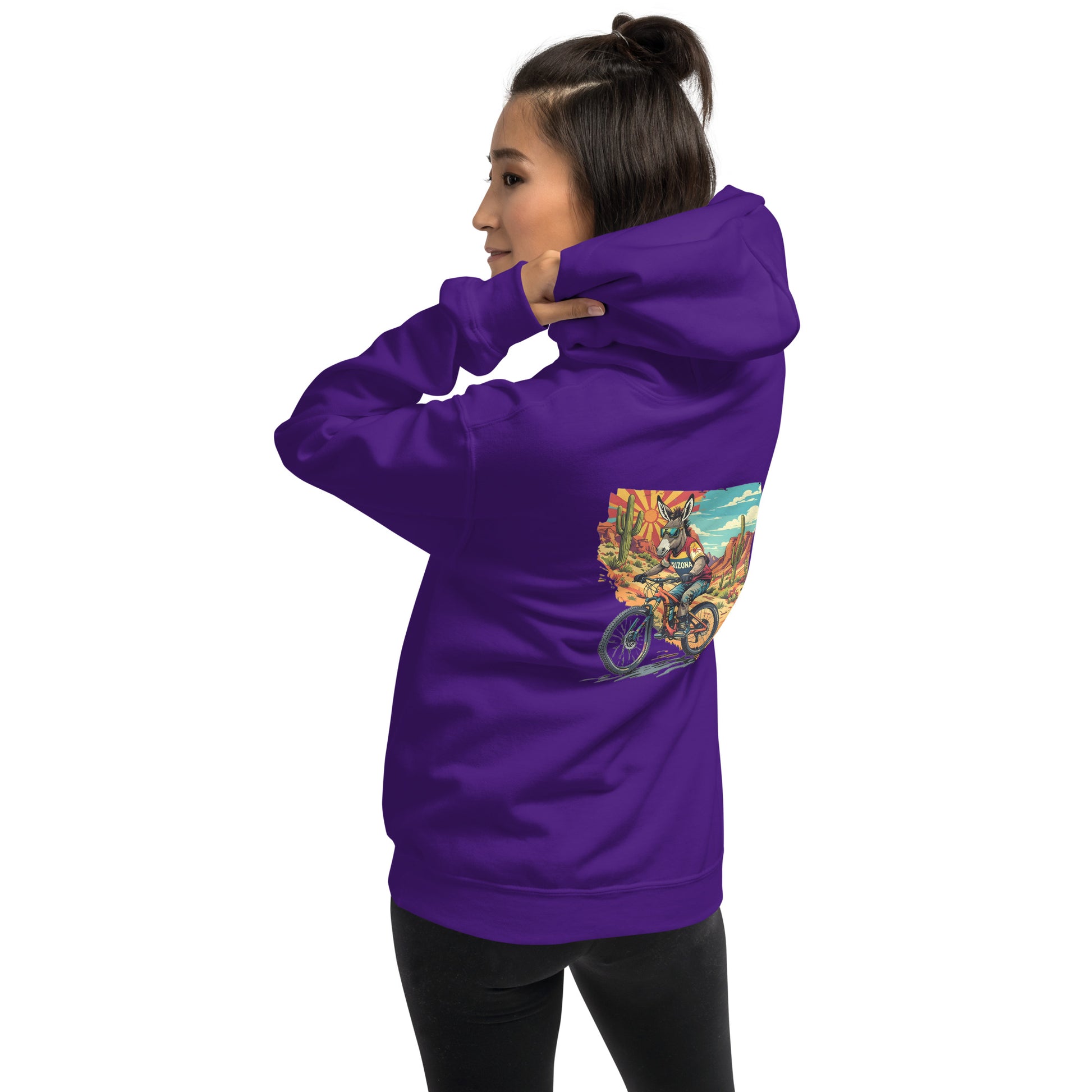 Person wearing a purple hoodie with a colorful graphic on the back against a white background