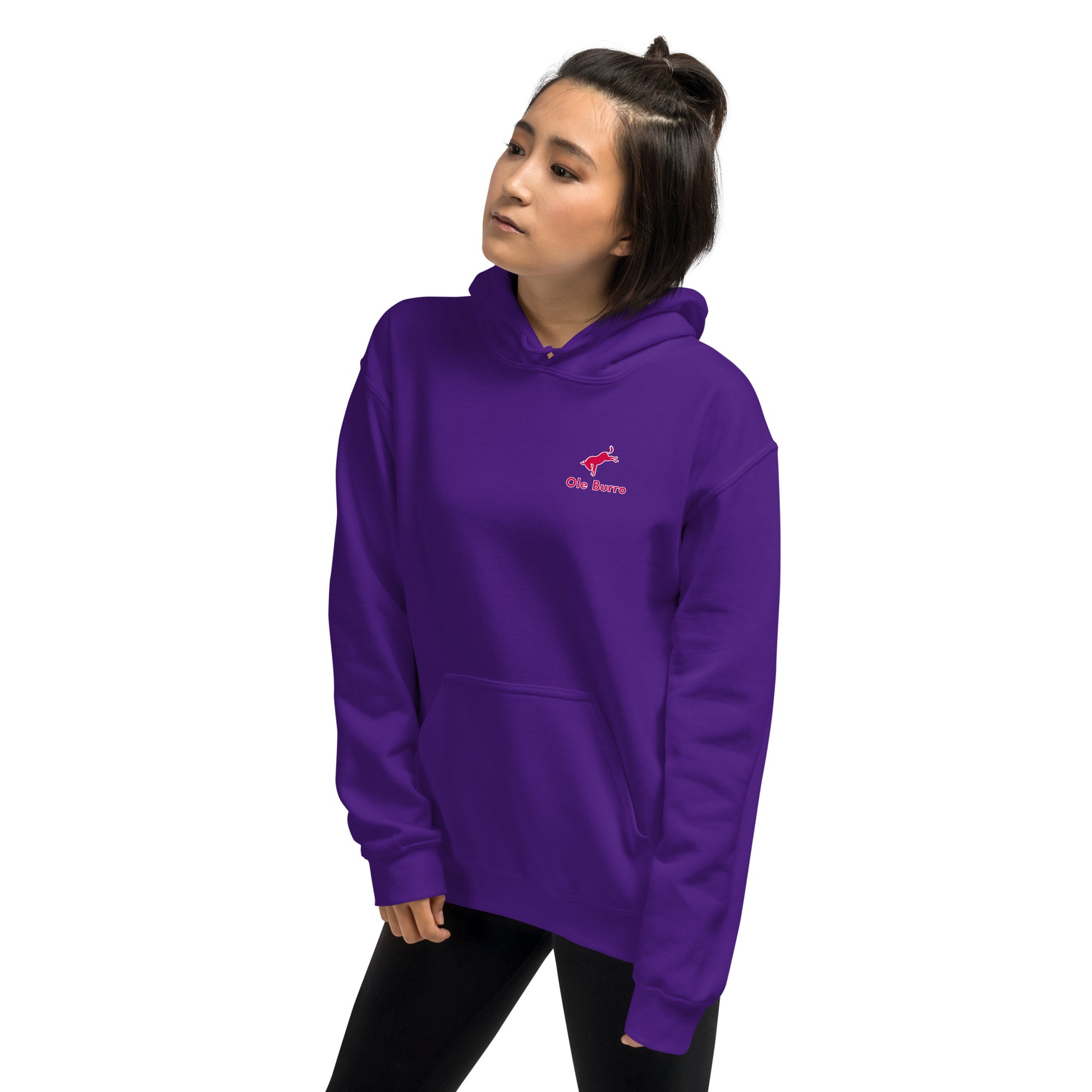 Person wearing a purple hoodie with a logo on a white background