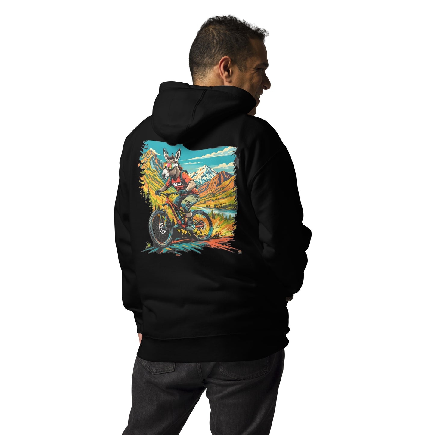Person wearing a black hoodie with a colorful graphic on the back, standing against a white background