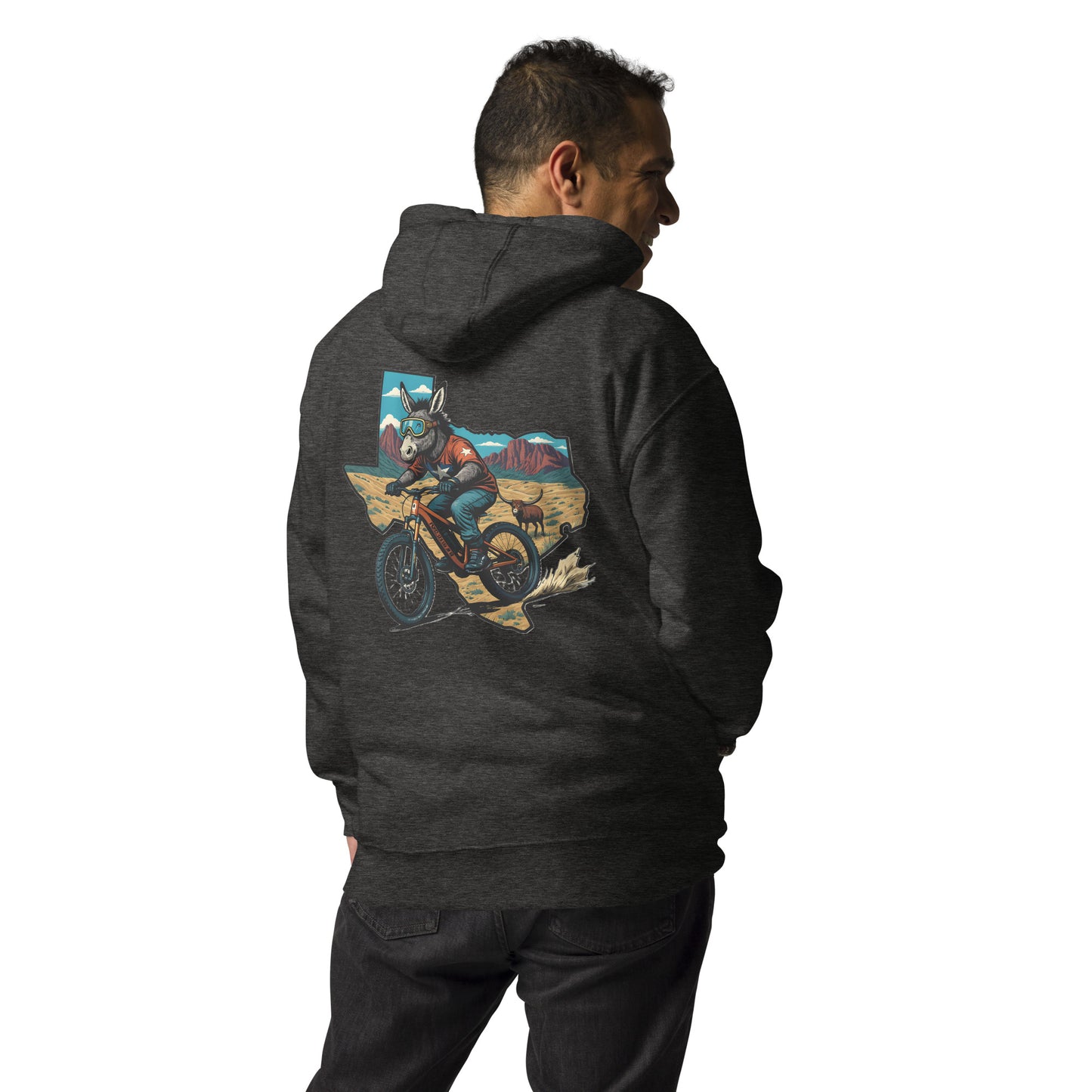 Person wearing a dark hoodie with a graphic design on the back, standing against a white background