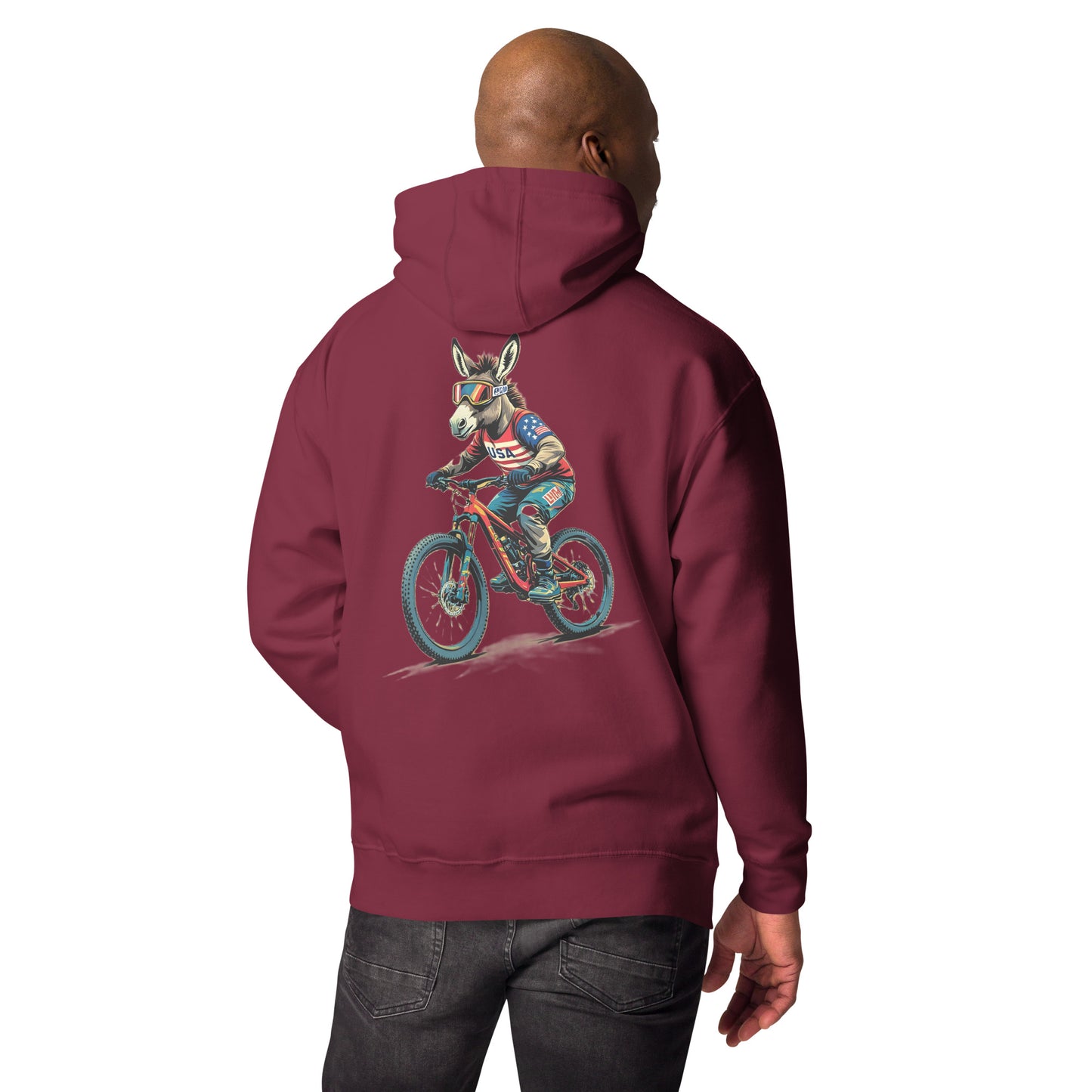 Person wearing a maroon hoodie with a graphic of a donkey on a bike on the back, on a white background