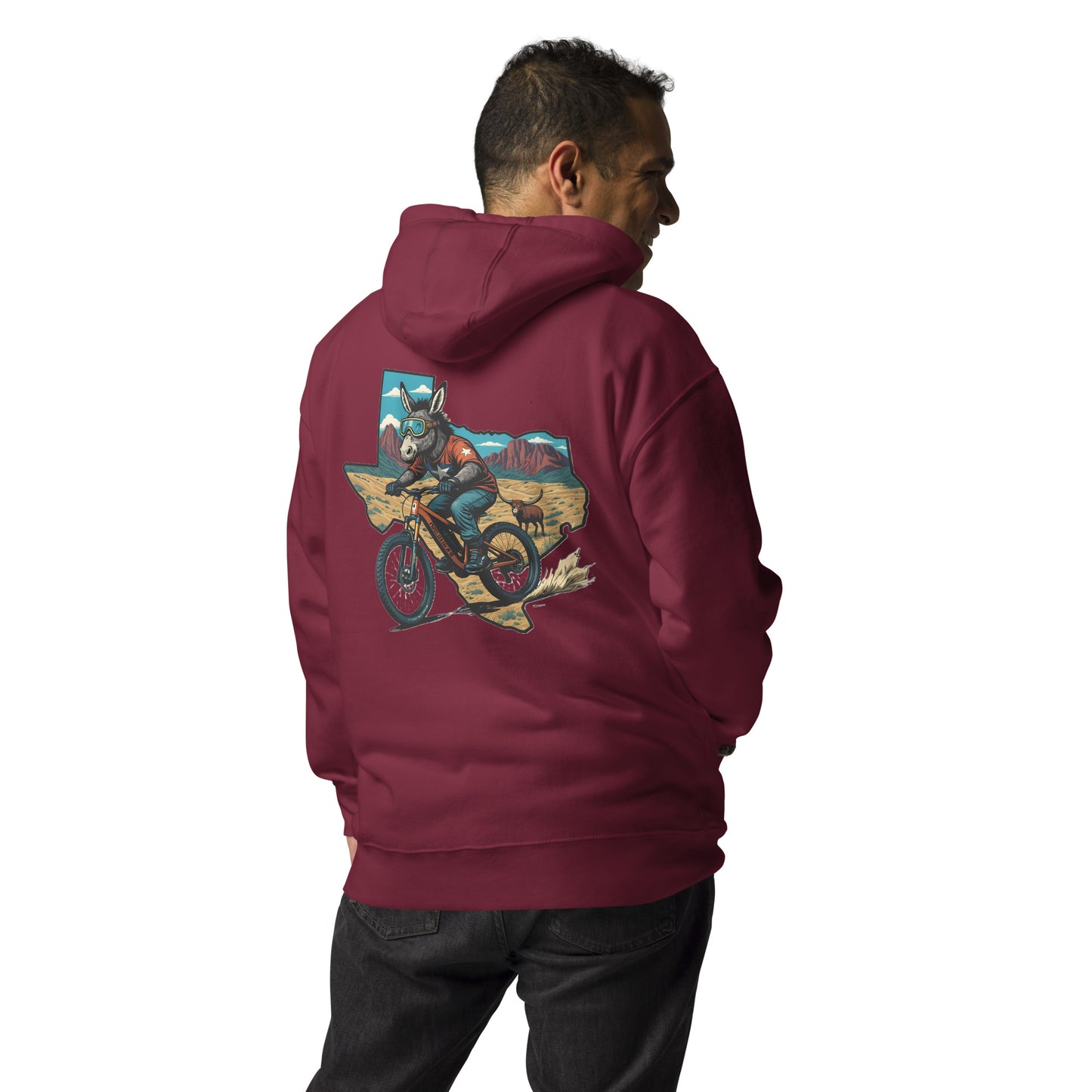 Person wearing a maroon hoodie with a colorful graphic on the back, standing against a white background