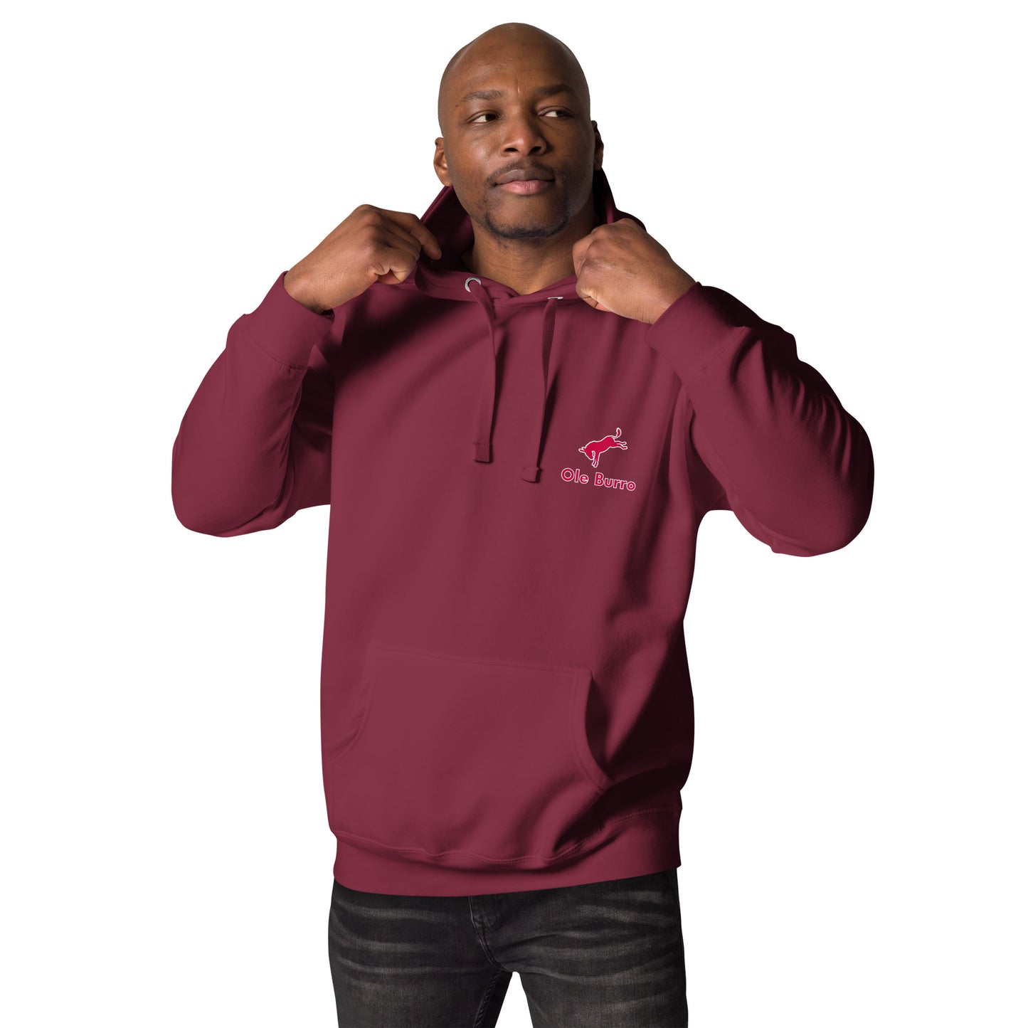 Man wearing a maroon hoodie with a logo on a white background