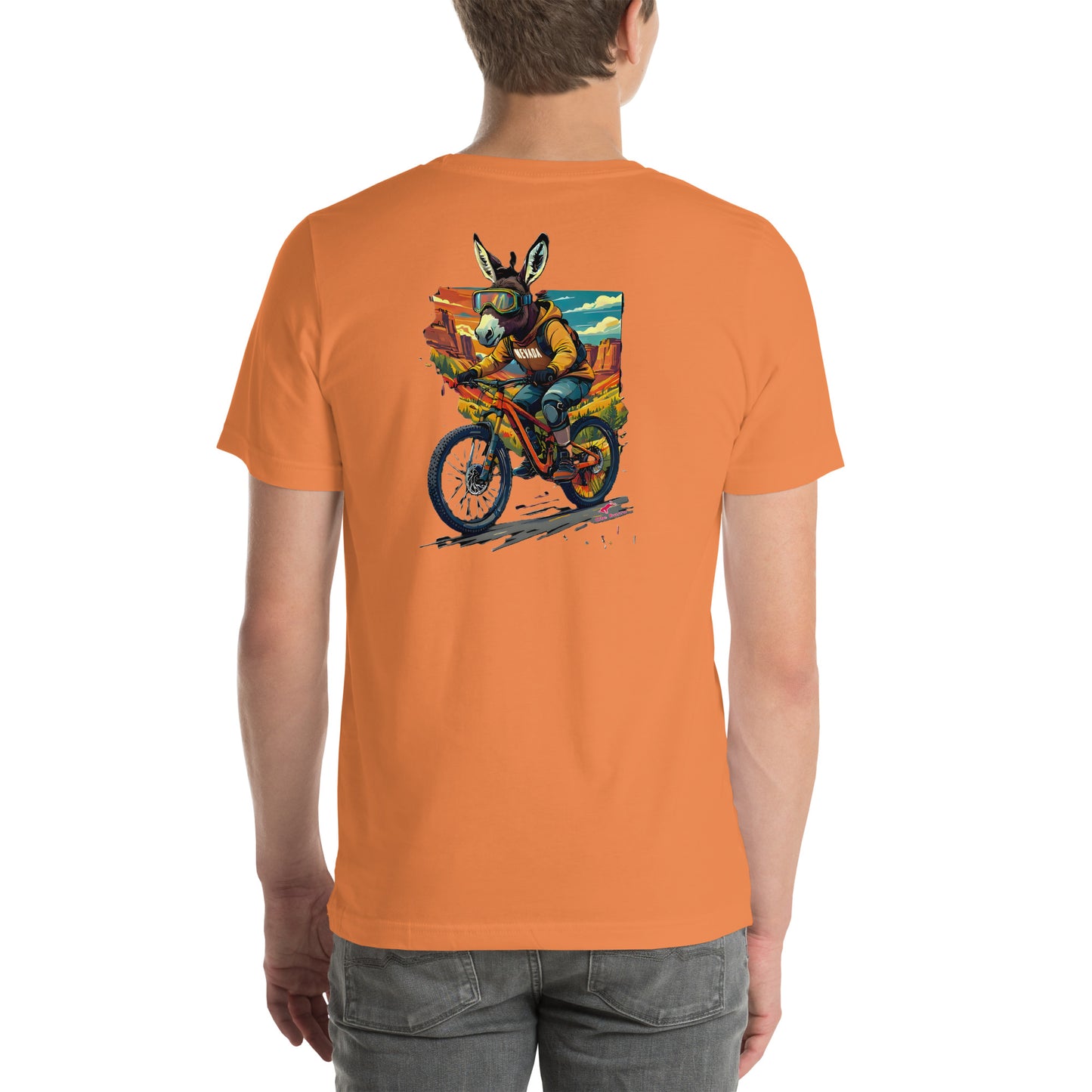 Person wearing an orange t-shirt with a graphic of a burro on a mountain bike on the back. on a white background