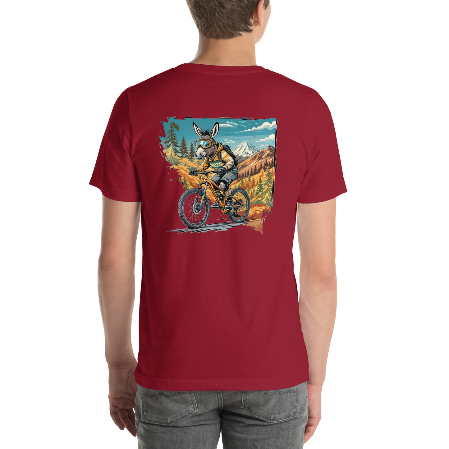 Red t-shirt with a graphic of a person riding a bike in a mountainous landscape on a white background.