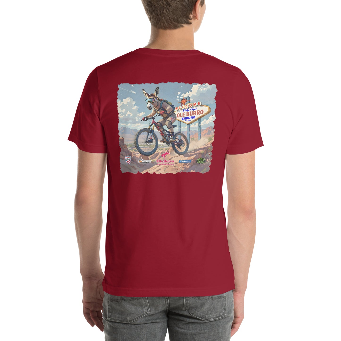 Red t-shirt with a graphic design on the back, worn by a person.