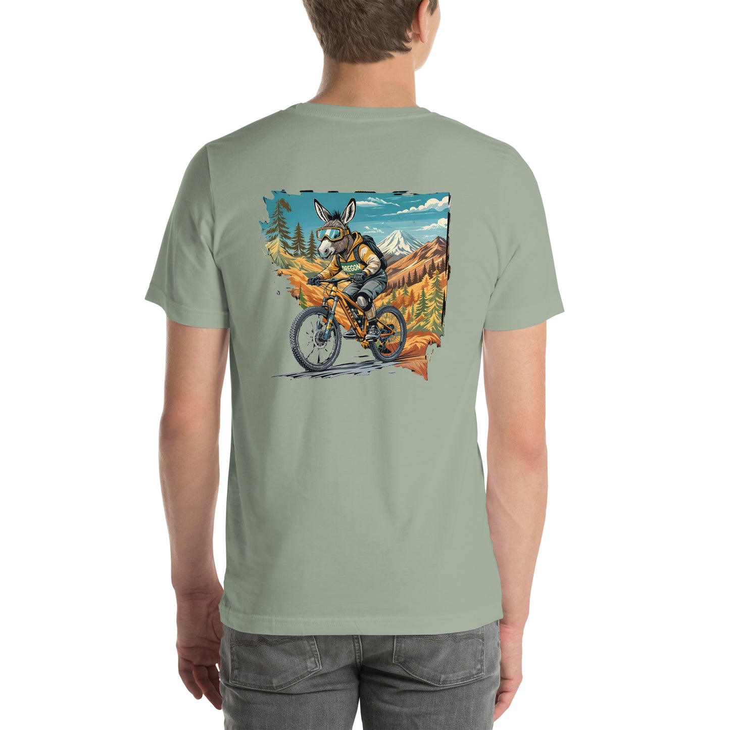 Person wearing a light green t-shirt with a graphic of a donkey riding a bike in a mountainous landscape on the back.