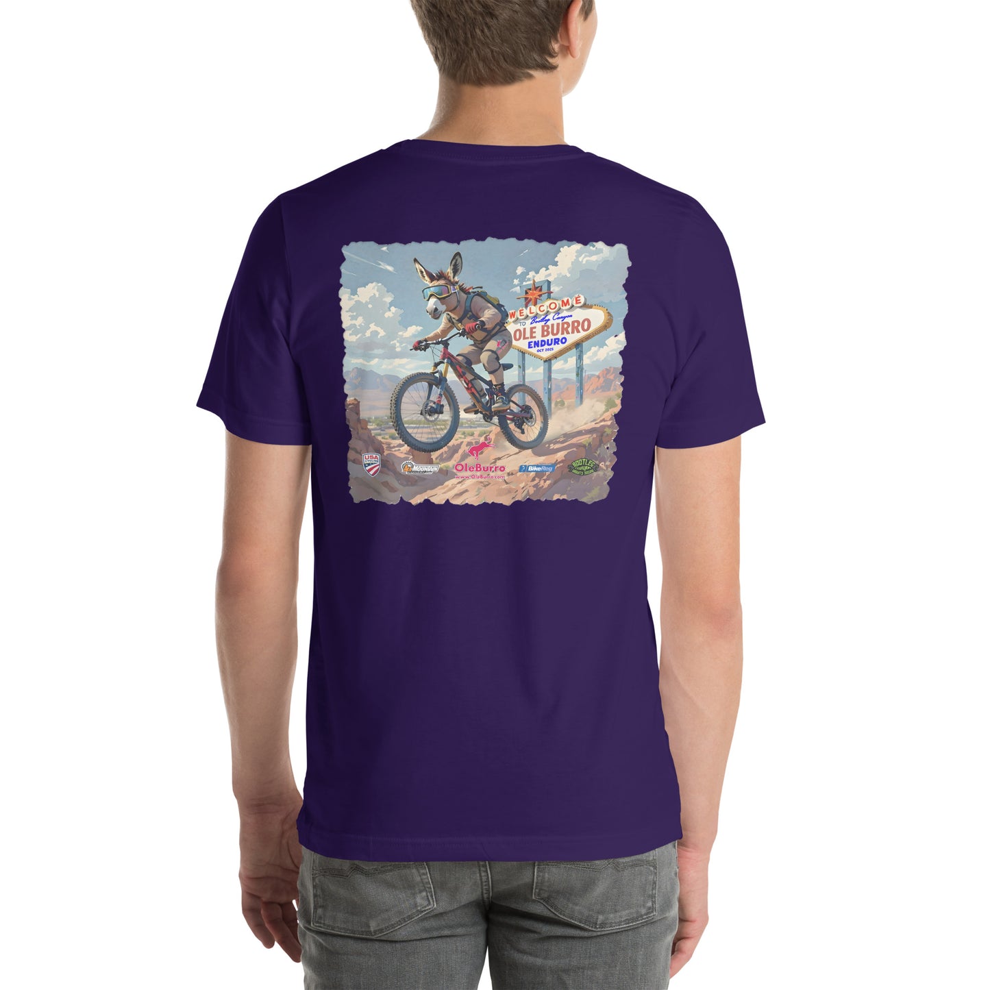 Person wearing a purple t-shirt with a graphic design on the back, standing against a white background.