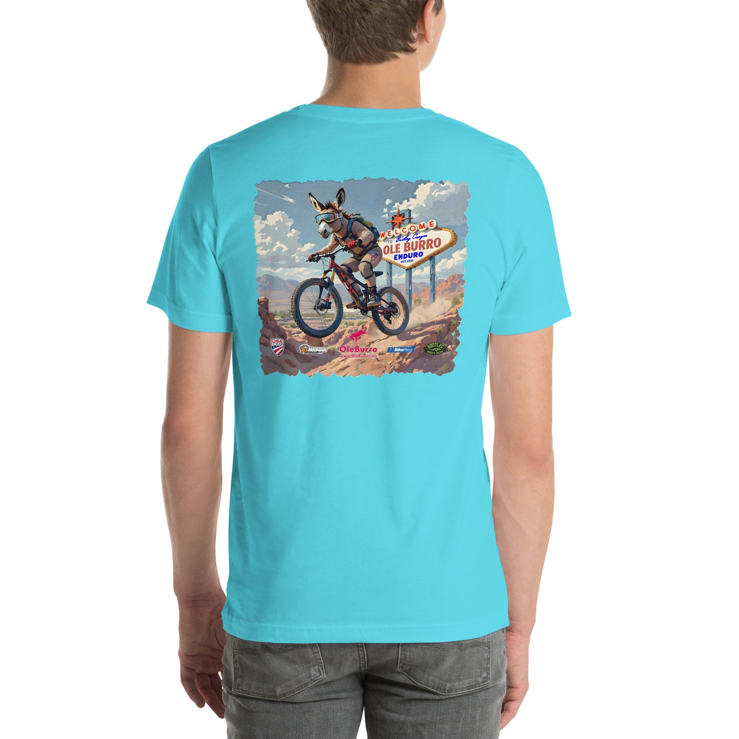 Person wearing a turquoise t-shirt with a graphic design on the back