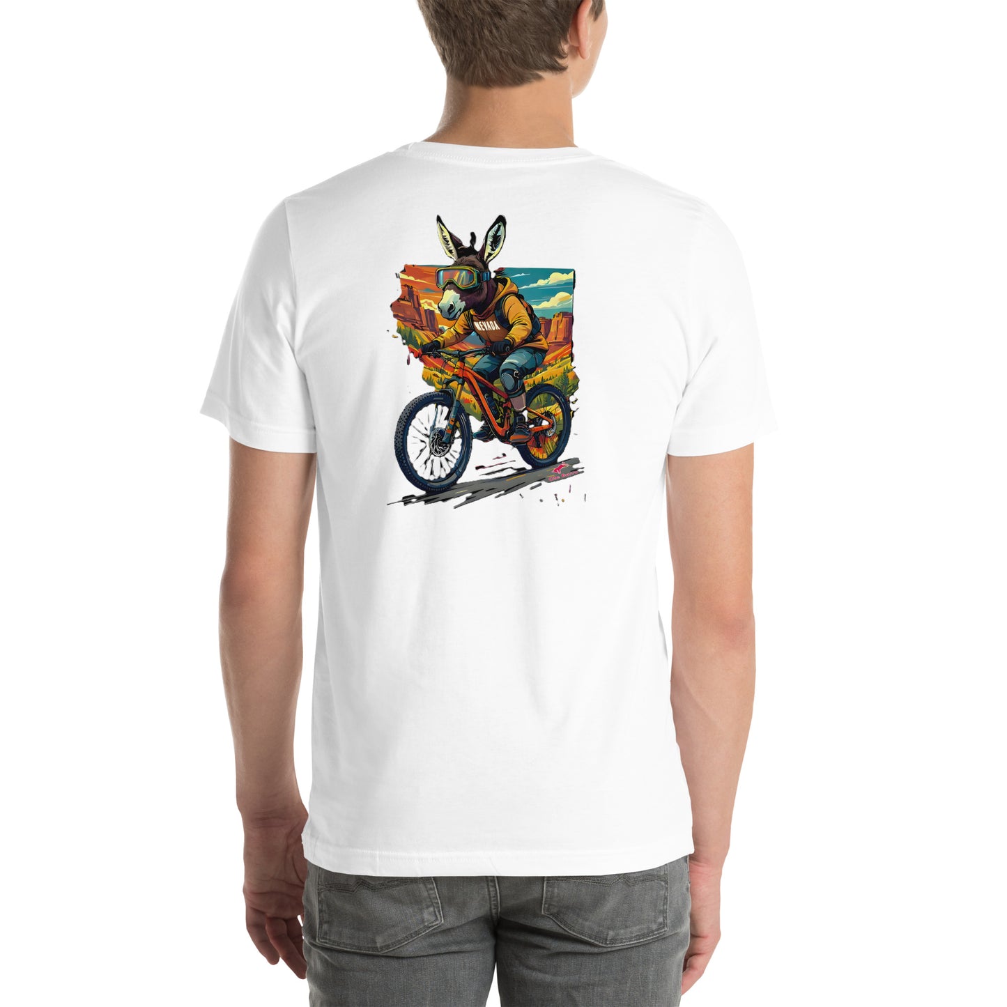White t-shirt with a colorful graphic of a person riding a, burro on a mountain bike on the back. worn by a person.