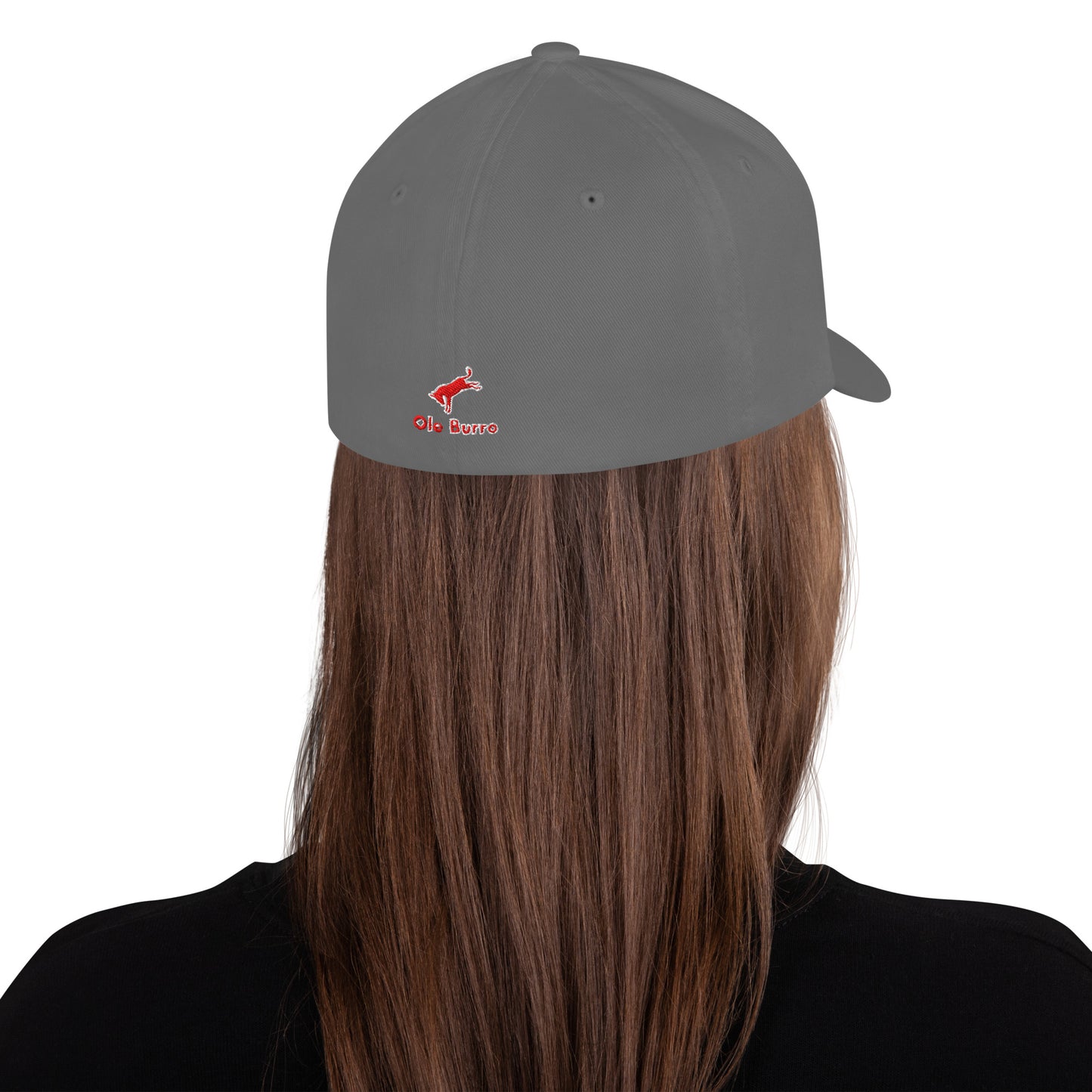 Person wearing a gray cap with a logo on a white background