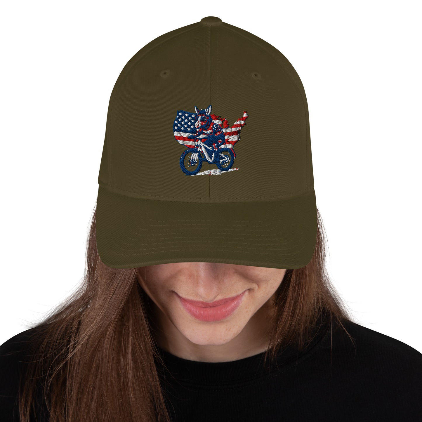 Person wearing a green cap with a graphic design of a motorcycle and American flag on a white background