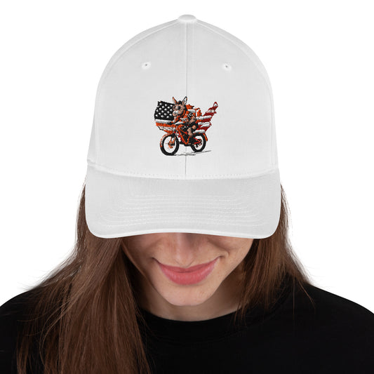 White cap with a graphic design of a person on a motorcycle and American flag, worn by a person.