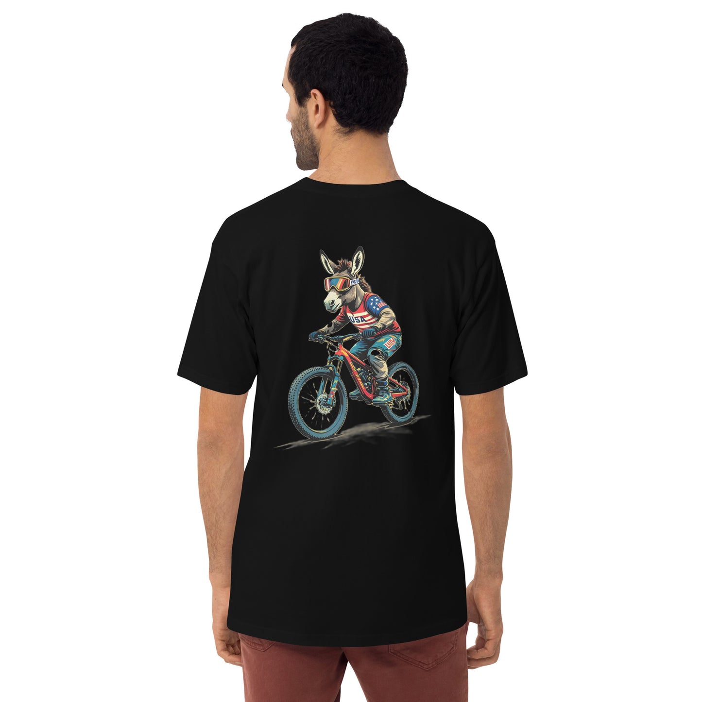 Person wearing a black t-shirt with a donkey riding a bicycle graphic on the back.