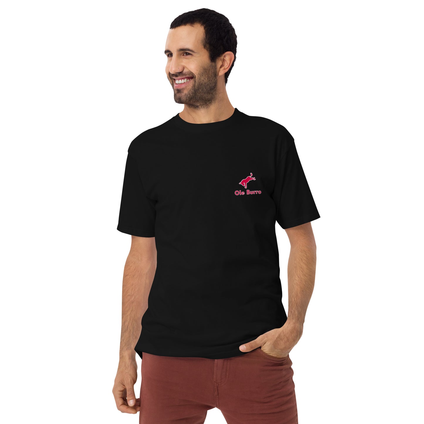 Man wearing a black t-shirt with a red logo and text on a white background