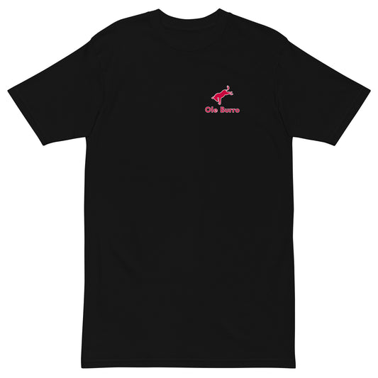 Black t-shirt with a small pink logo on the chest against a white background