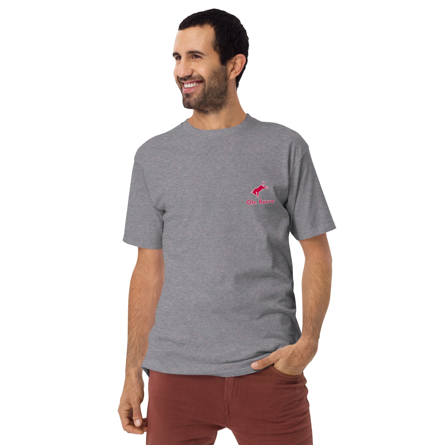 Man wearing a gray t-shirt with a red logo on a white background