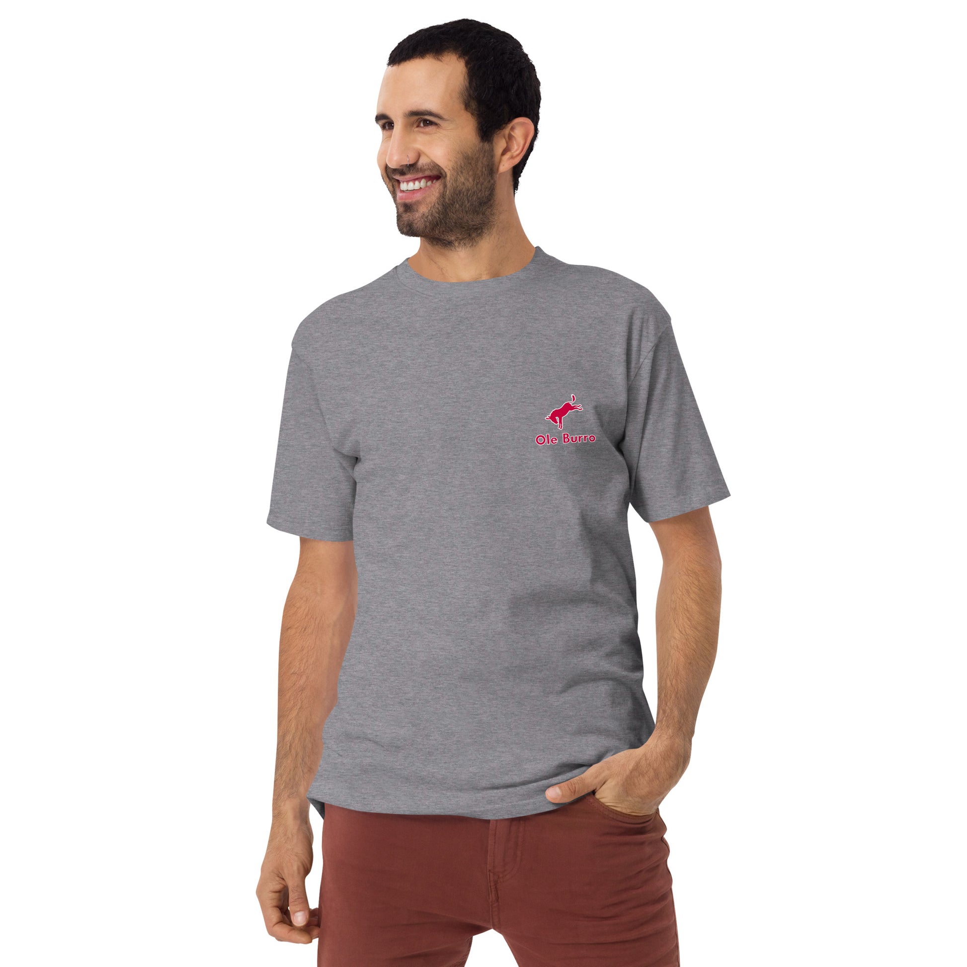 Man wearing a gray t-shirt with a red logo on a white background